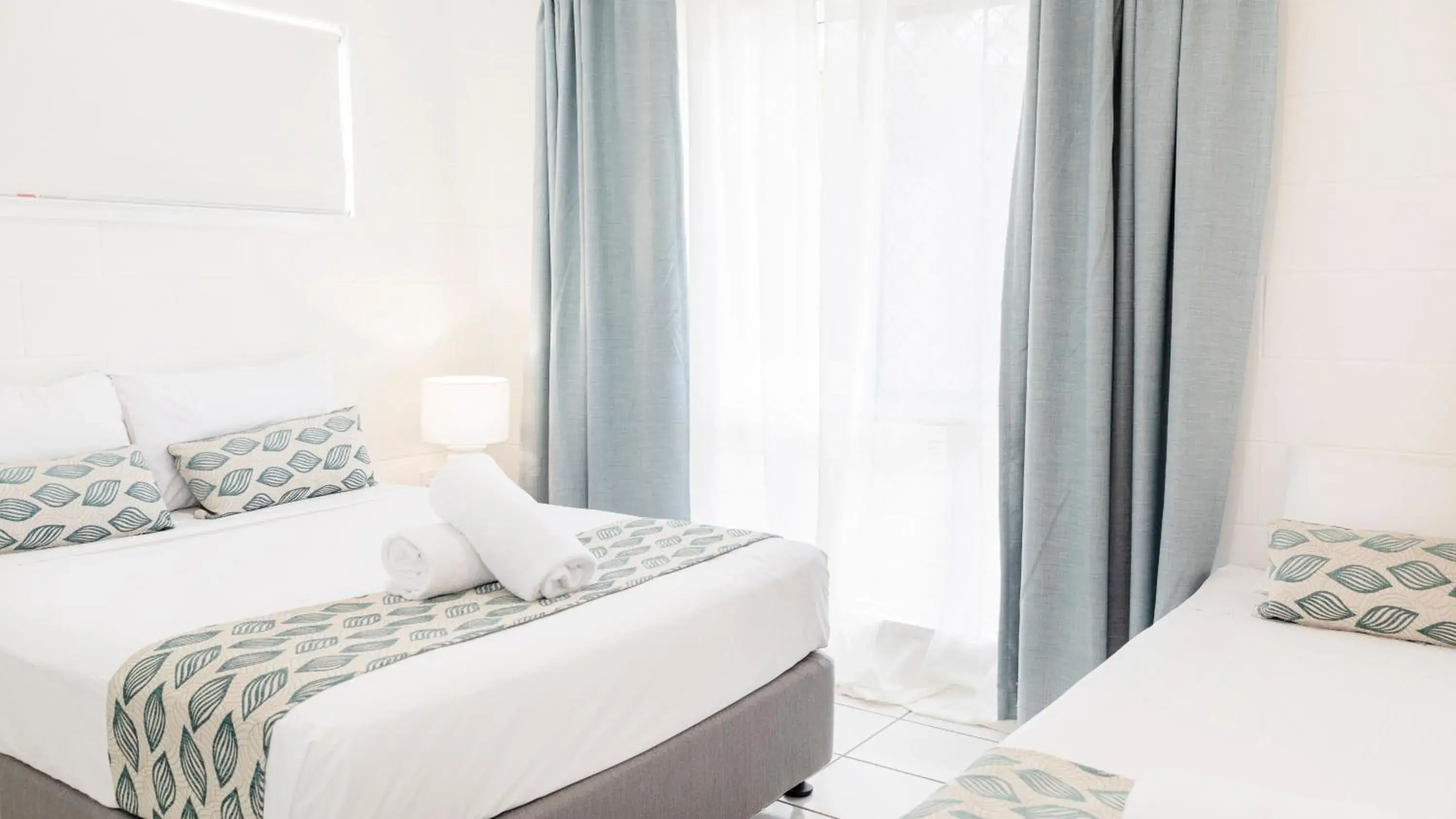 Bed in Palm View Holiday Apartments Bed in Palm View Holiday Apartments