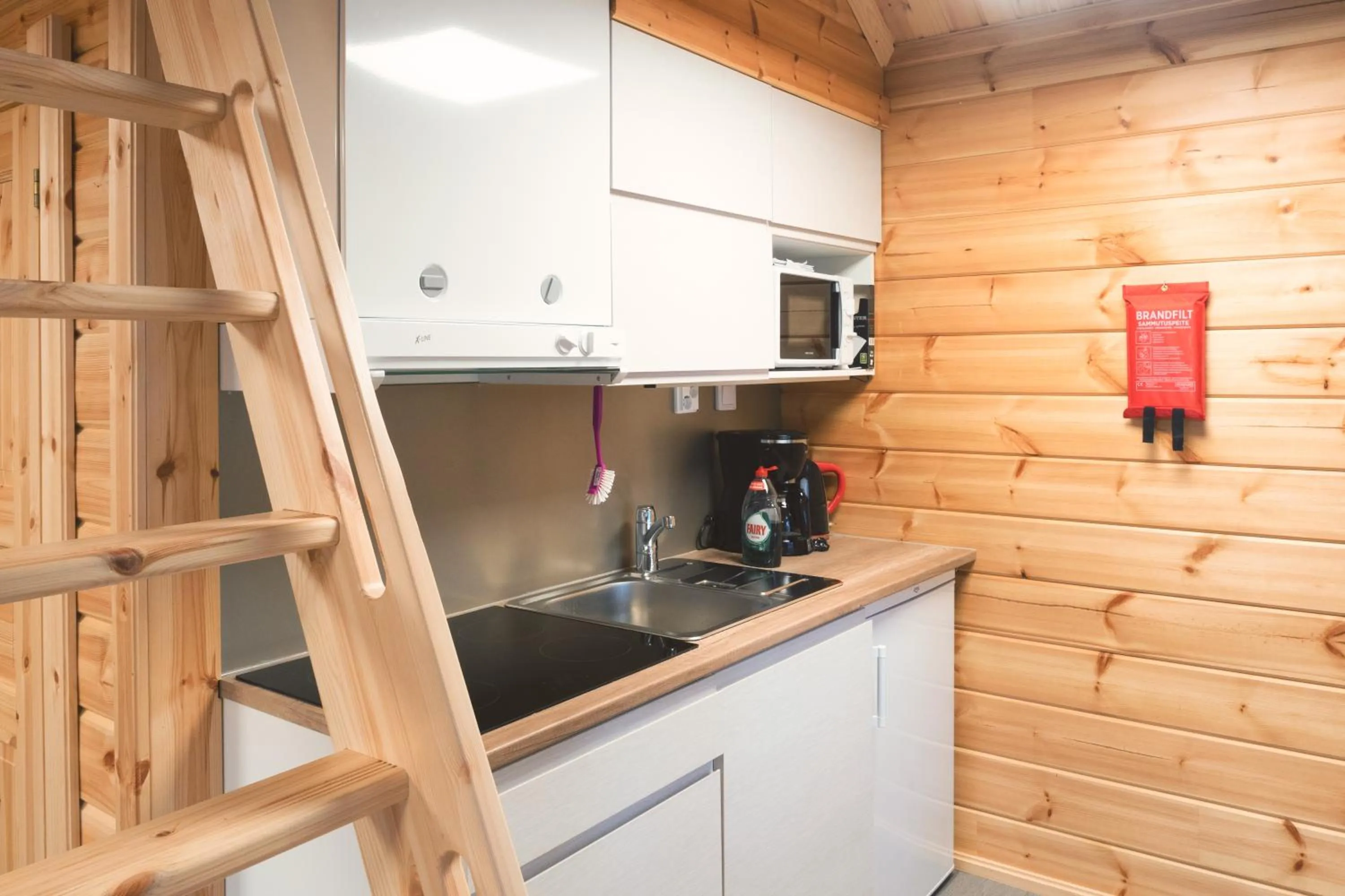Kitchen or kitchenette in Harriniva Adventure Resort Cabins