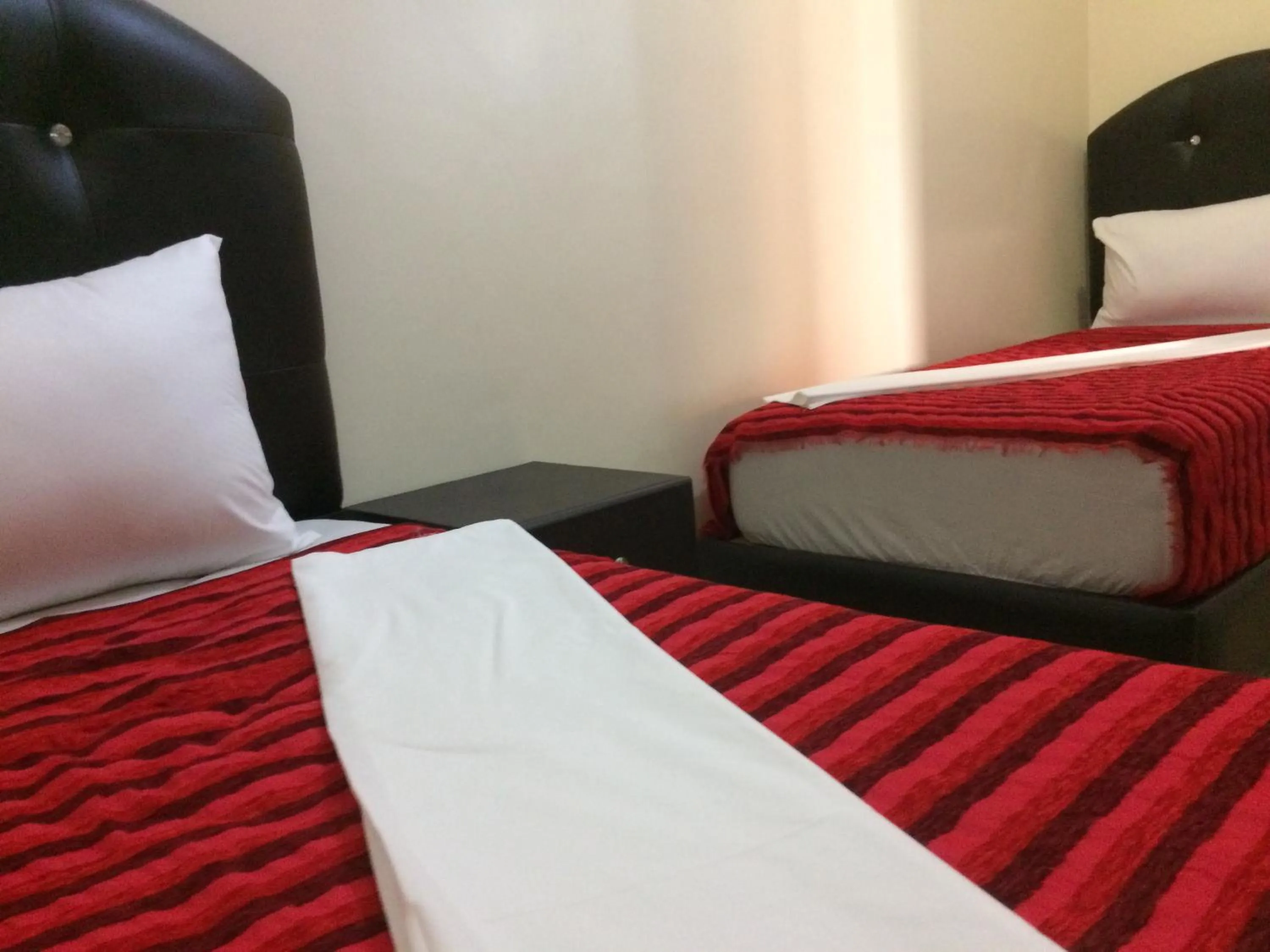 Bed in ITRANE GUEST HOUSE