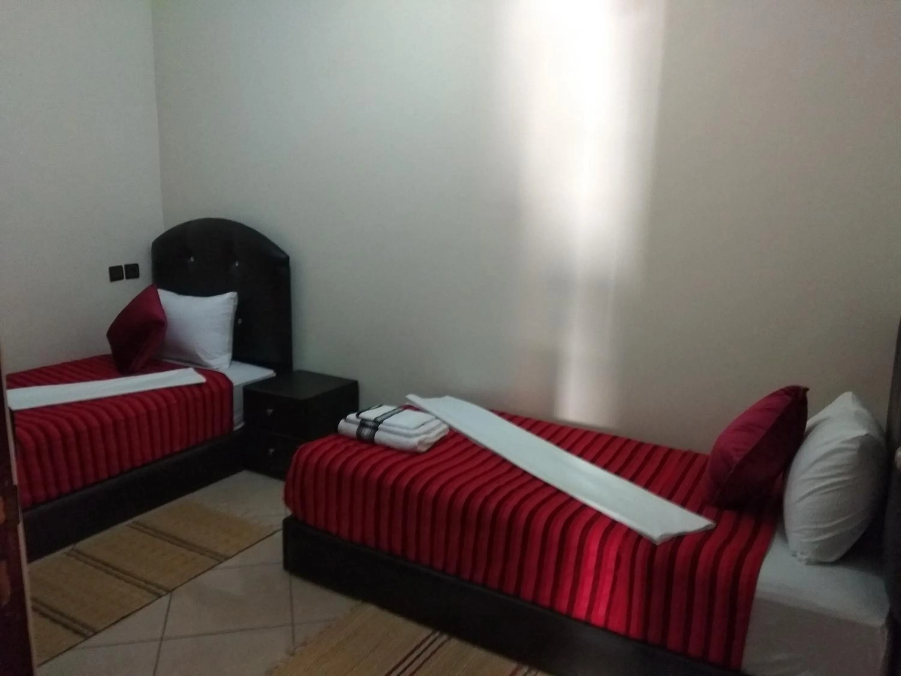 Bed in ITRANE GUEST HOUSE