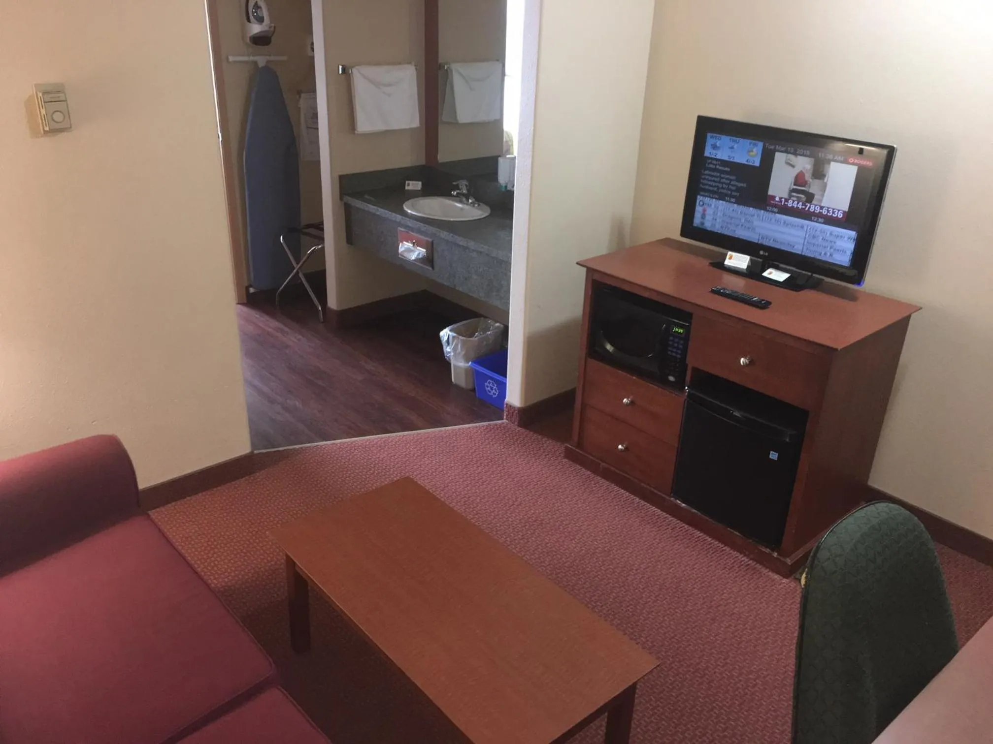 Photo of the whole room, TV/Entertainment Center in Super 8 by Wyndham St Johns