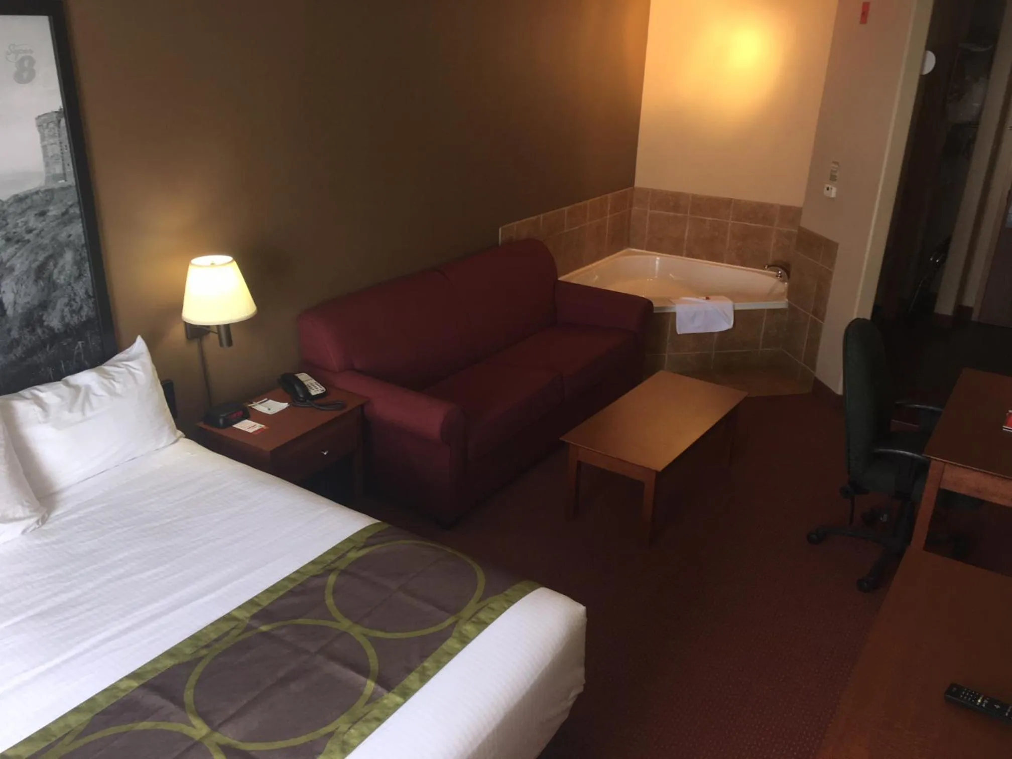 Photo of the whole room, Seating Area in Super 8 by Wyndham St Johns