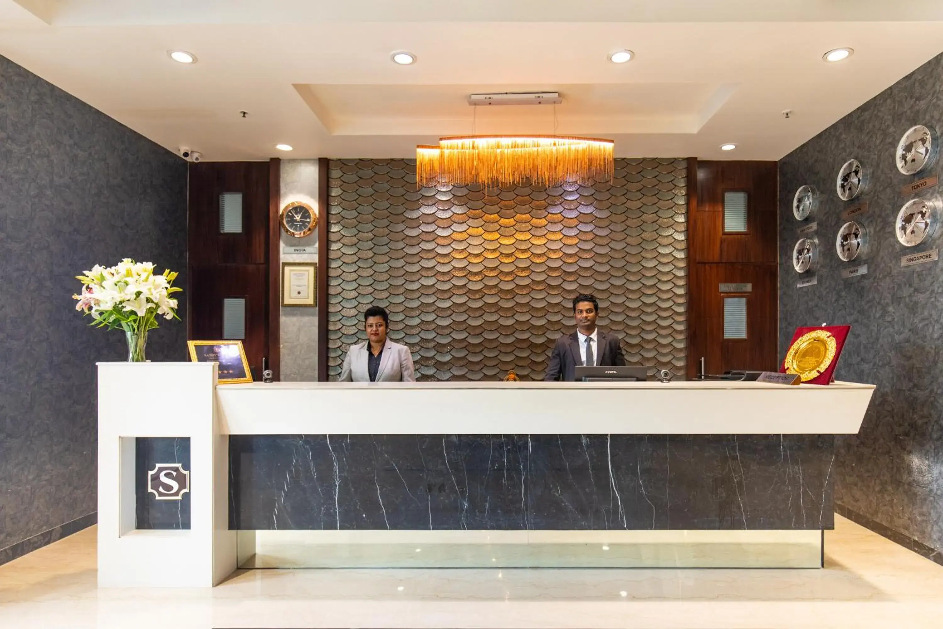 Lobby or reception in Hotel Sandy's Tower Lobby or reception in Hotel Sandy's Tower