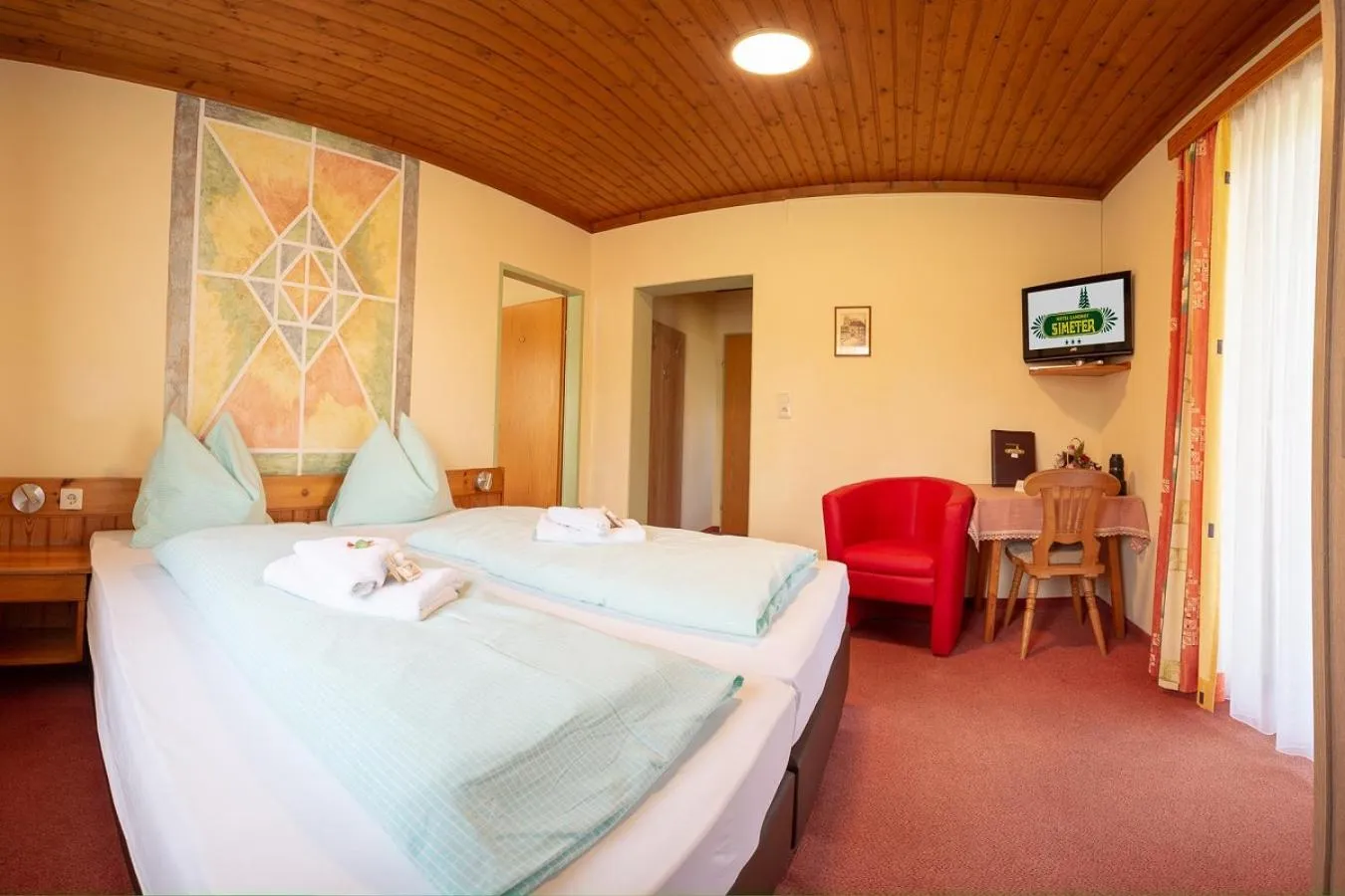 Photo of the whole room, Bed in Hotel Landhof Simeter GMBH