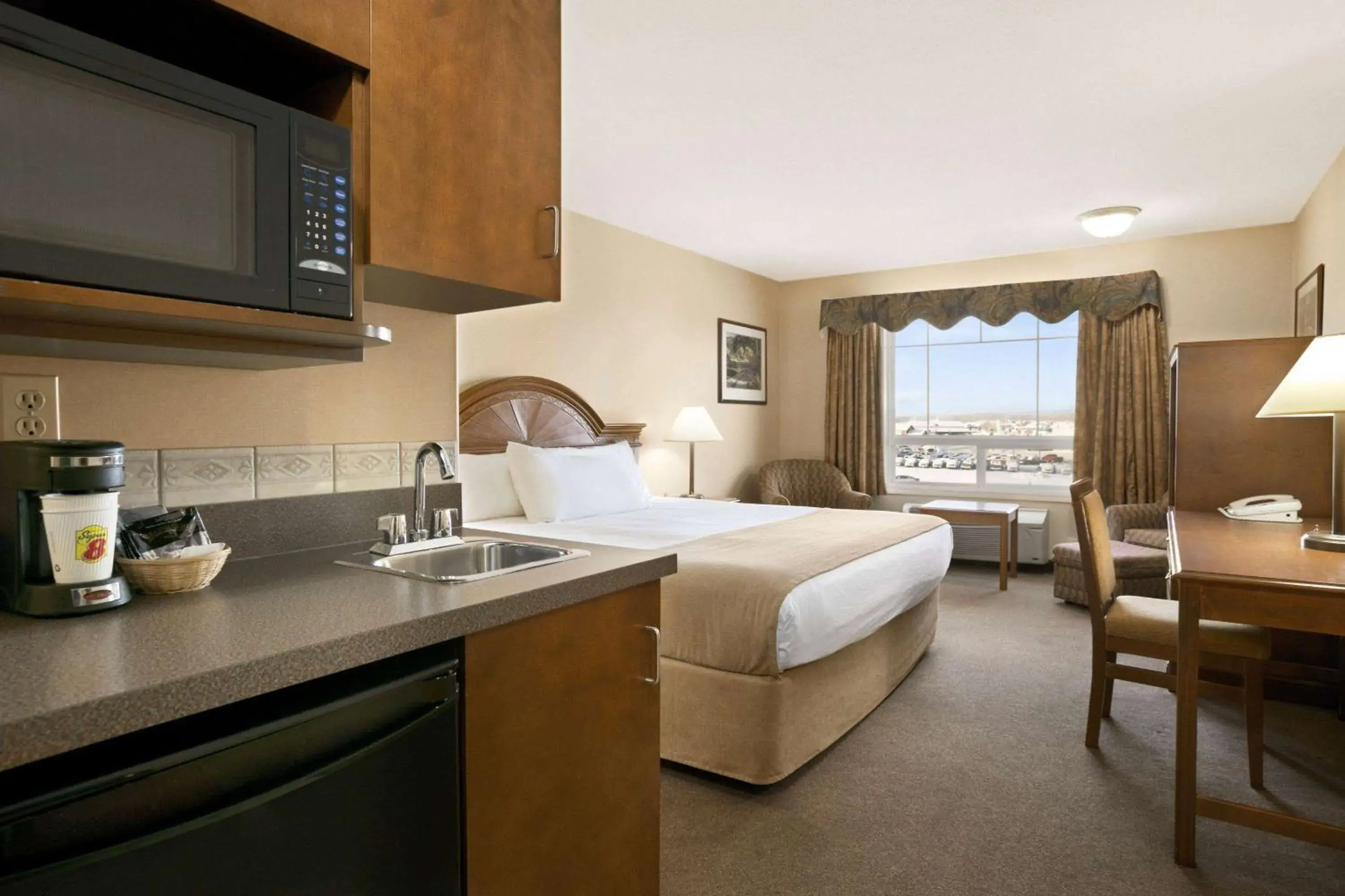 Photo of the whole room, Bed in Super 8 by Wyndham High Level AB Photo of the whole room, Bed in Super 8 by Wyndham High Level AB