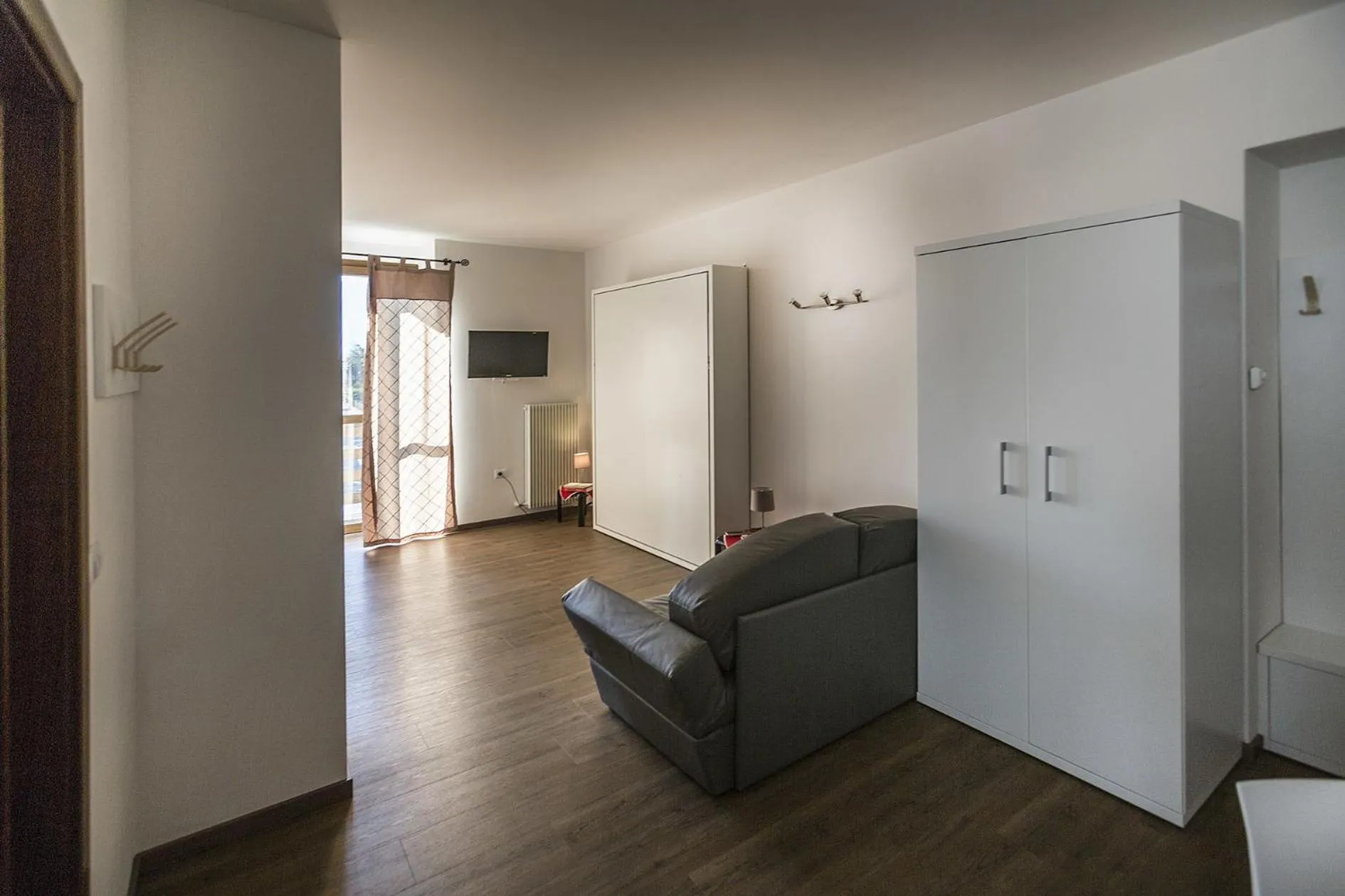 Living room in Le Servite Apartments