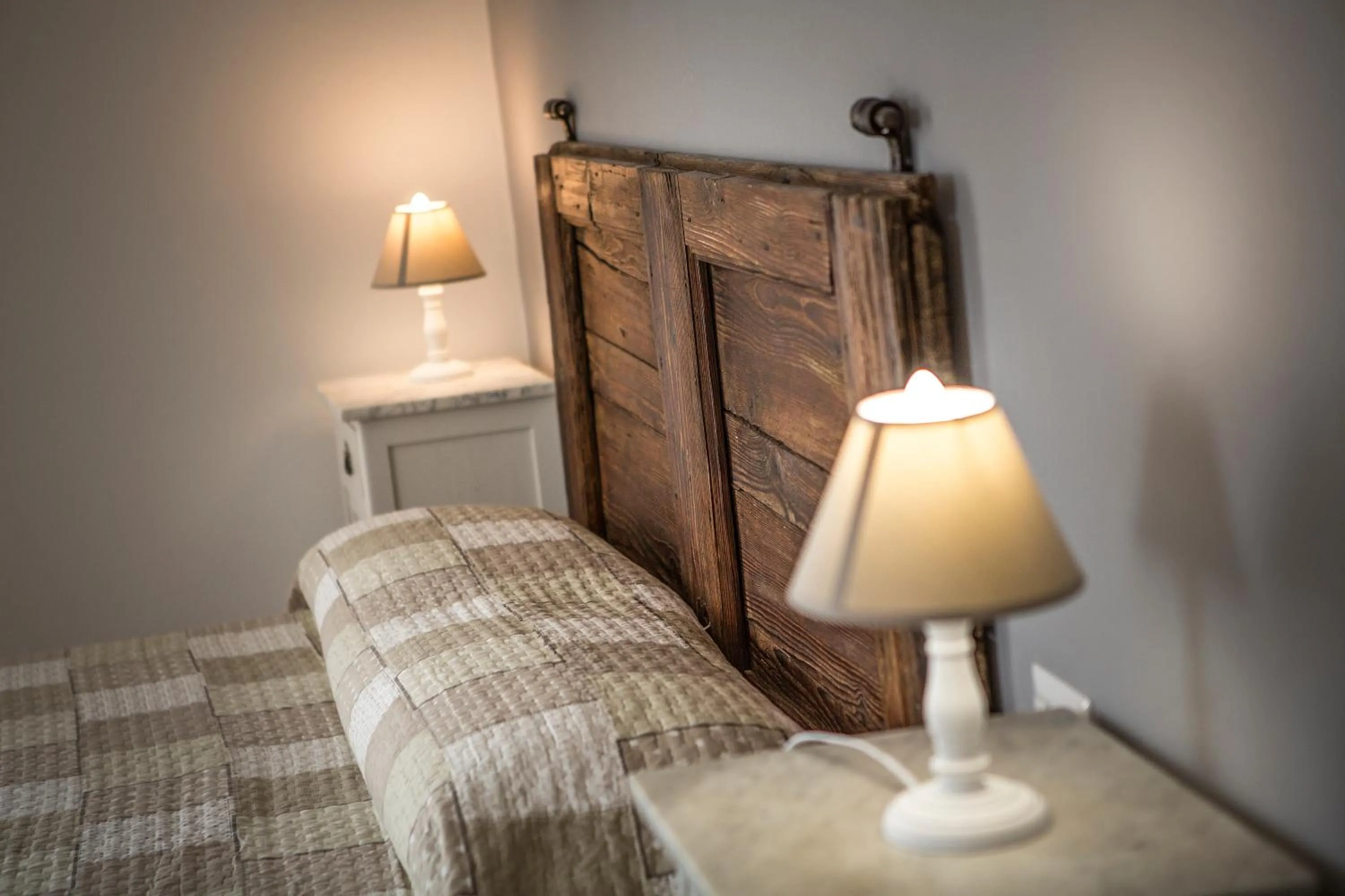 Bed in Le Servite Apartments