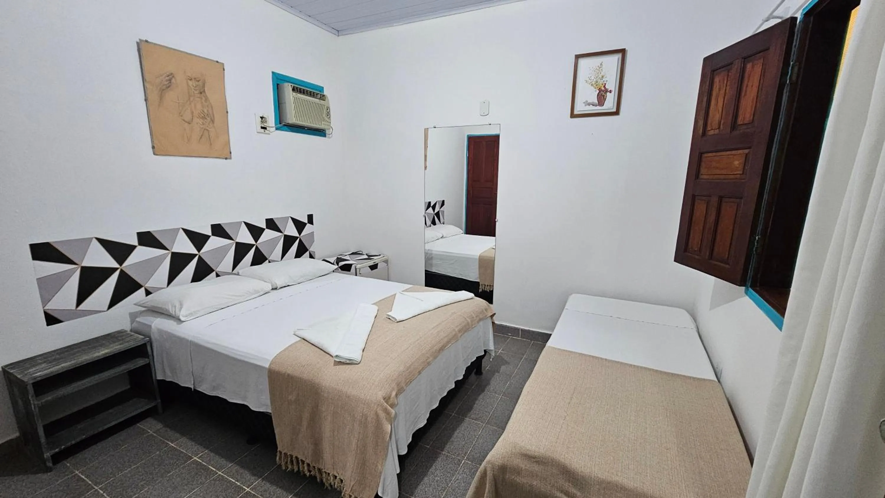 Photo of the whole room, Bed in Pousada Mikaela Arraial