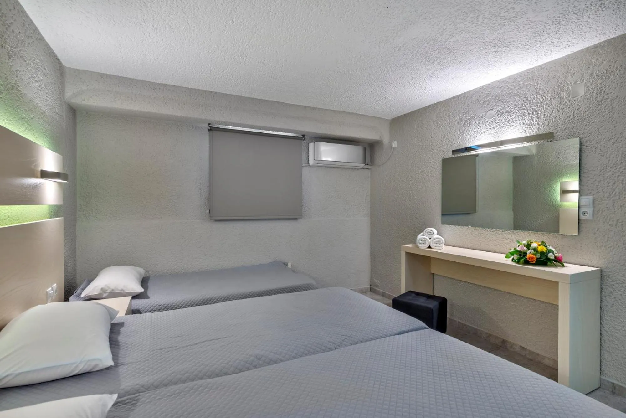 Bed in Halaris Rooms