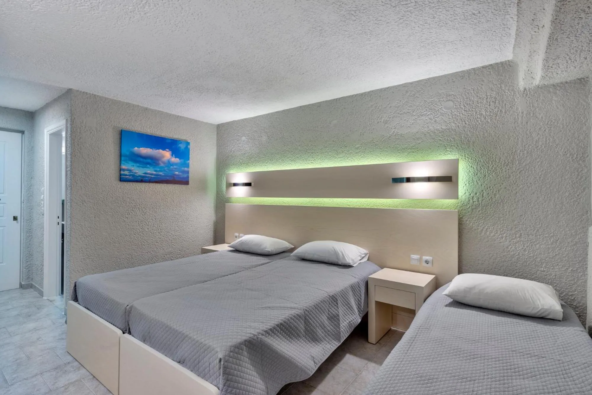Bed in Halaris Rooms