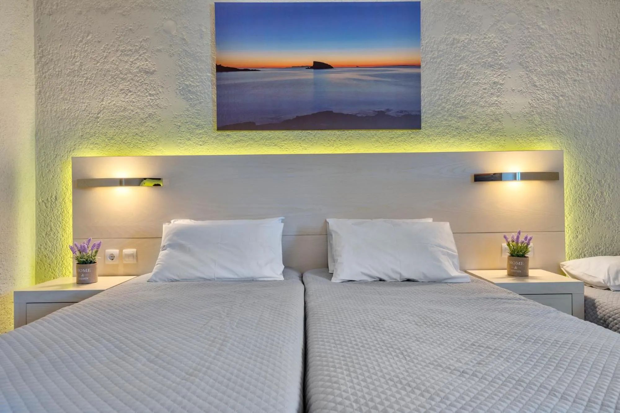 Bed in Halaris Rooms