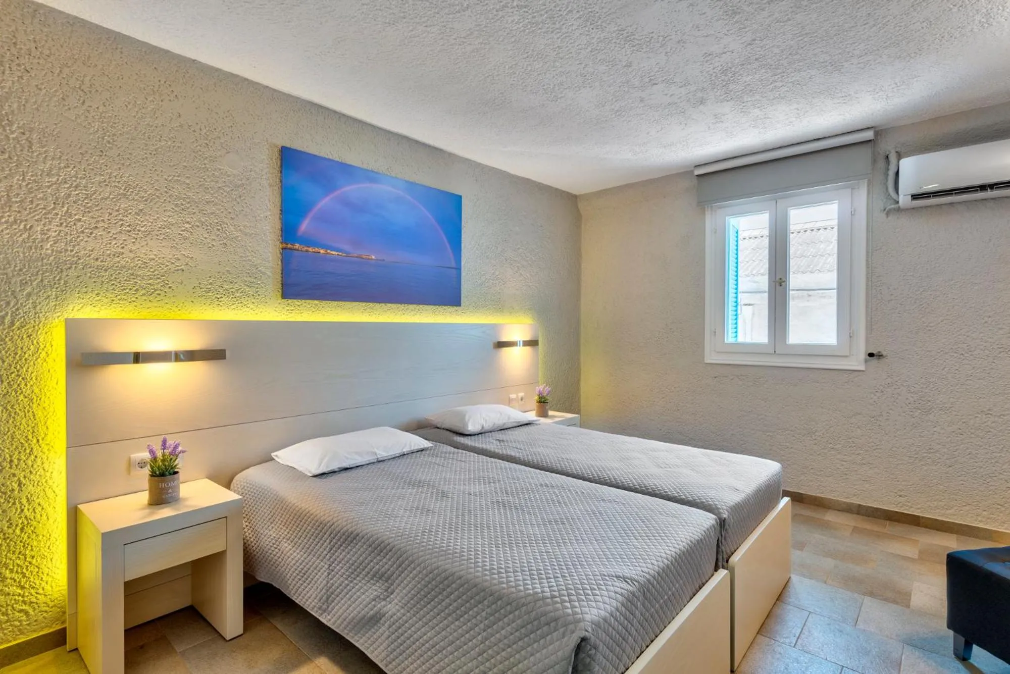Bed in Halaris Rooms