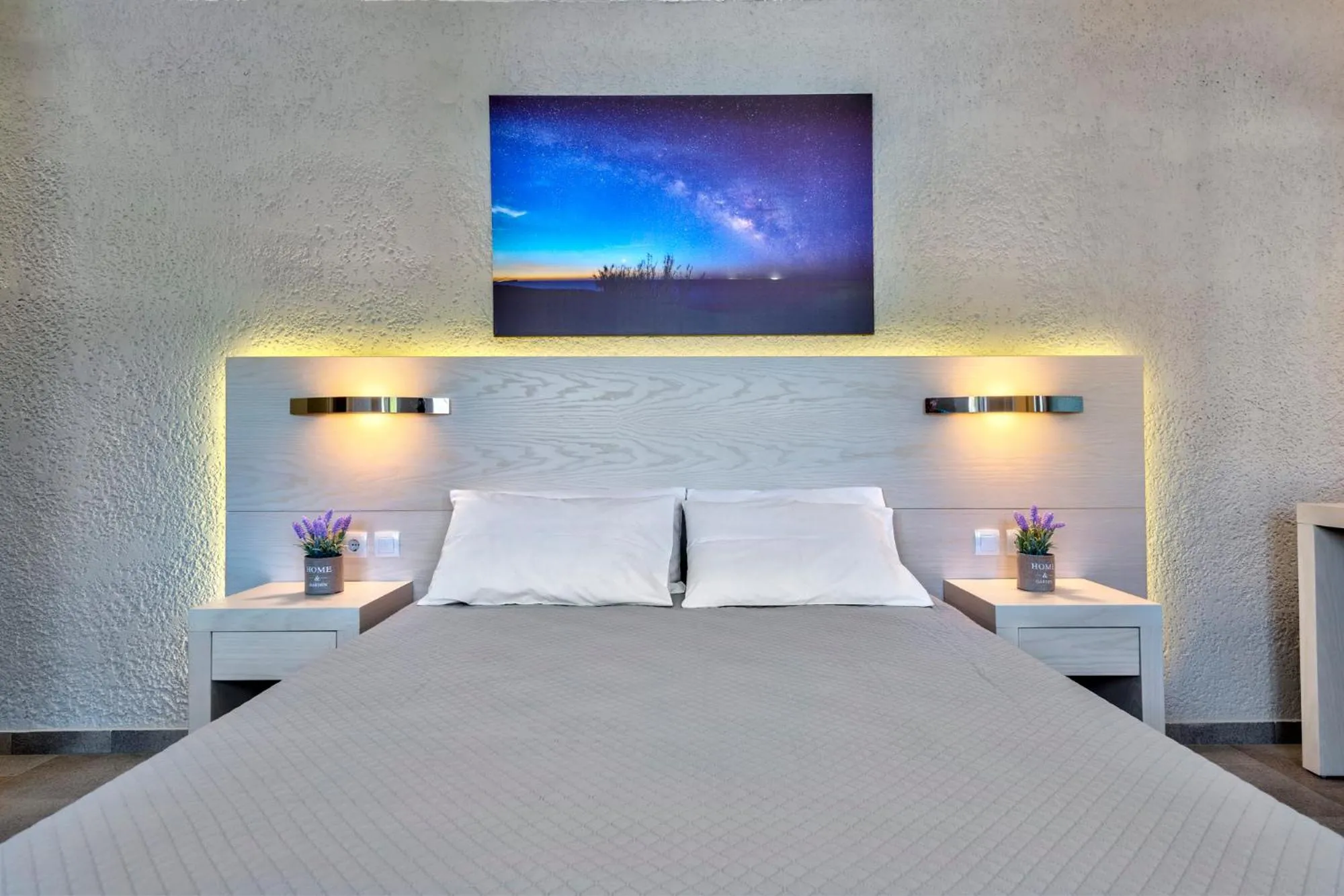 Bed in Halaris Rooms