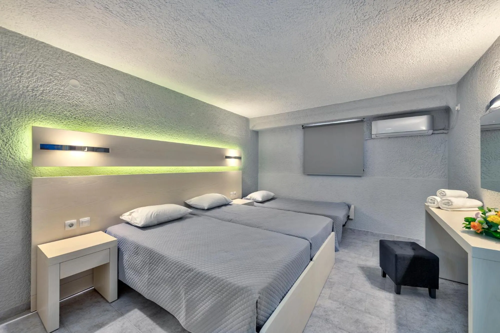 Bed in Halaris Rooms