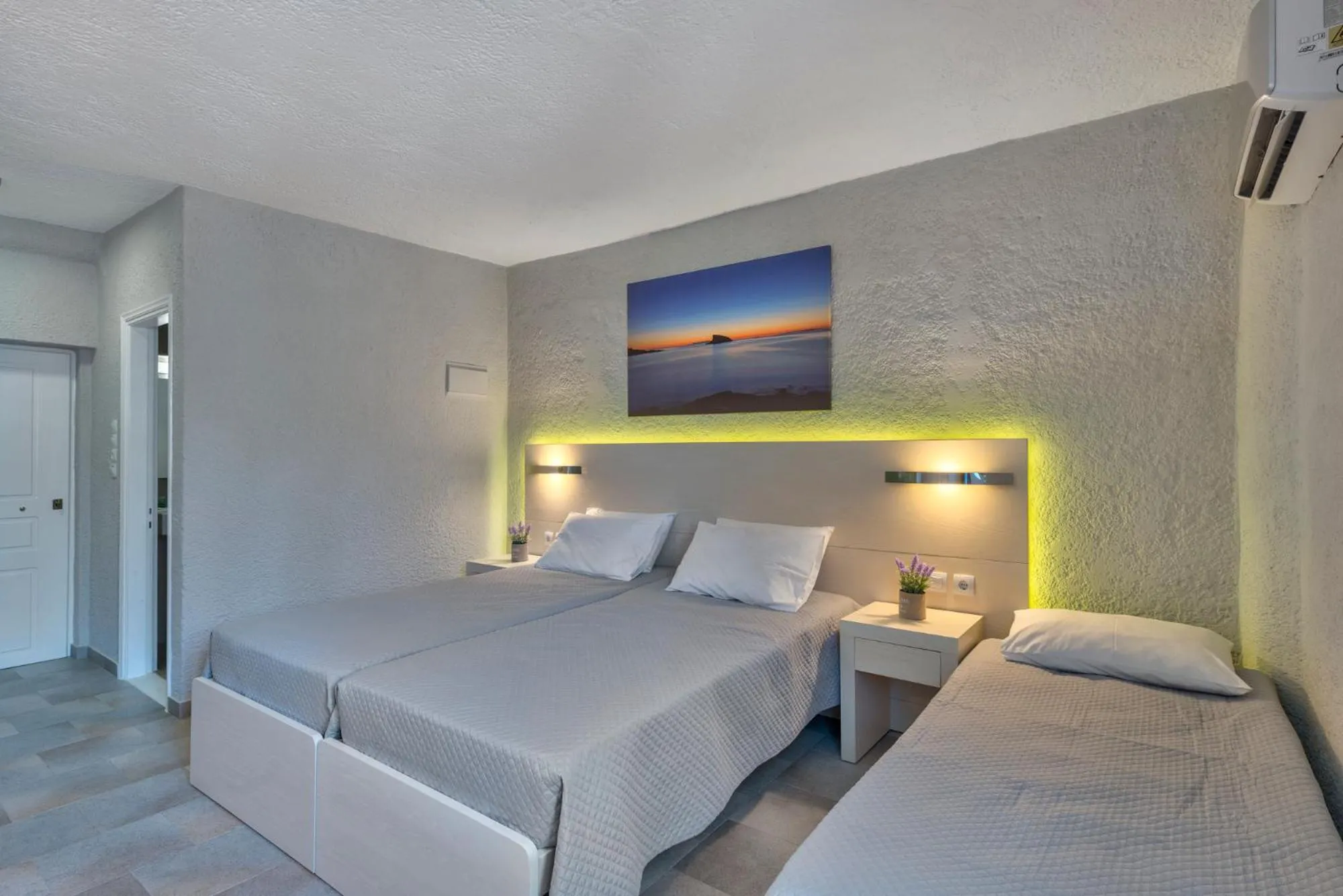 Bed in Halaris Rooms
