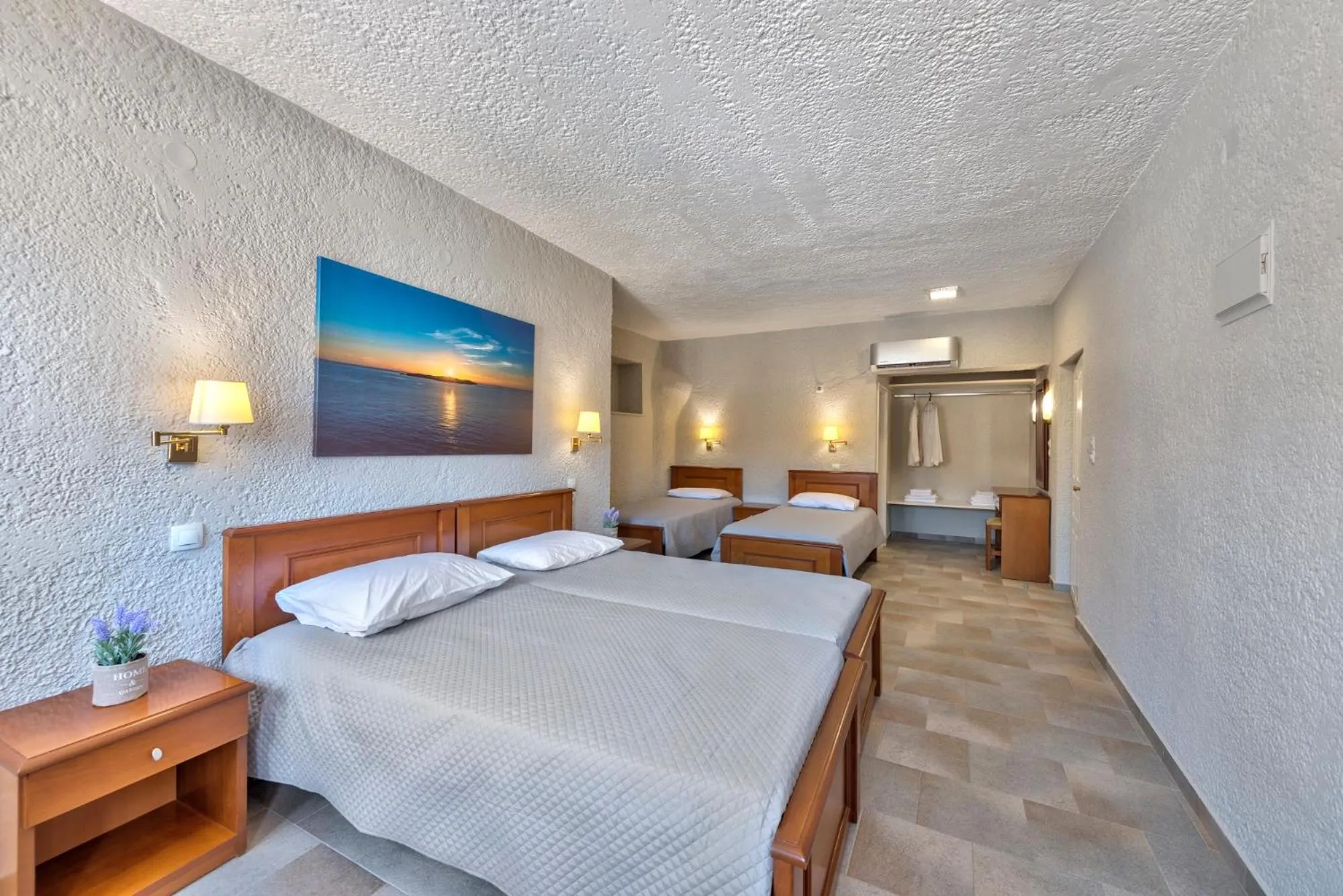 Bed in Halaris Rooms