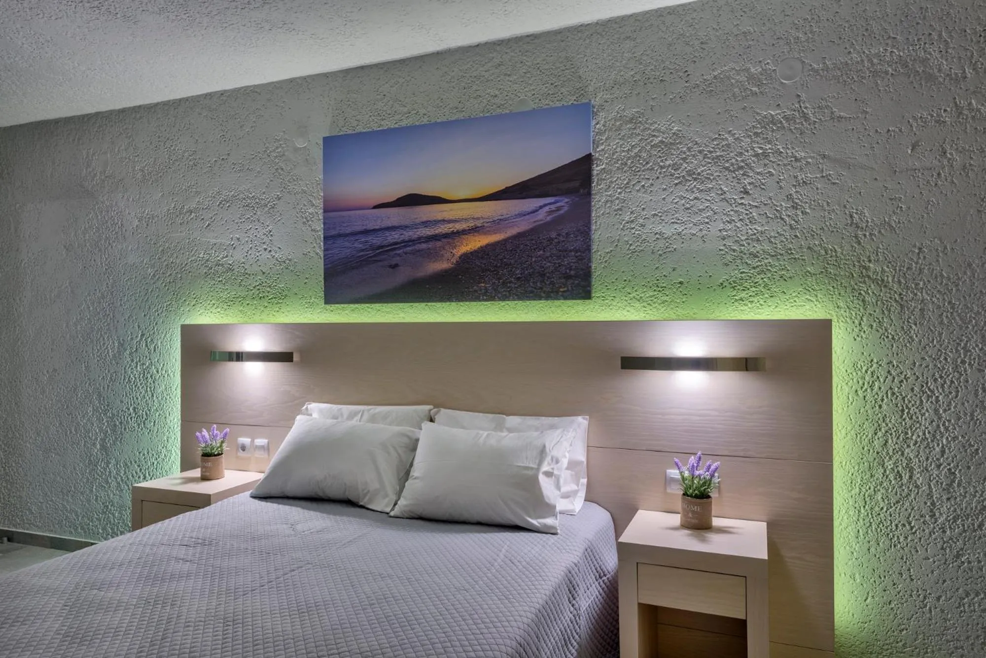 Bed in Halaris Rooms