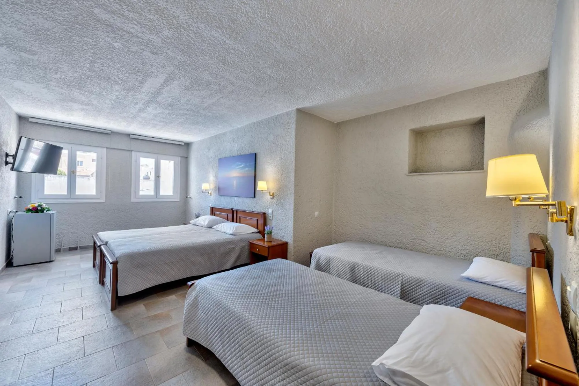 Bed in Halaris Rooms