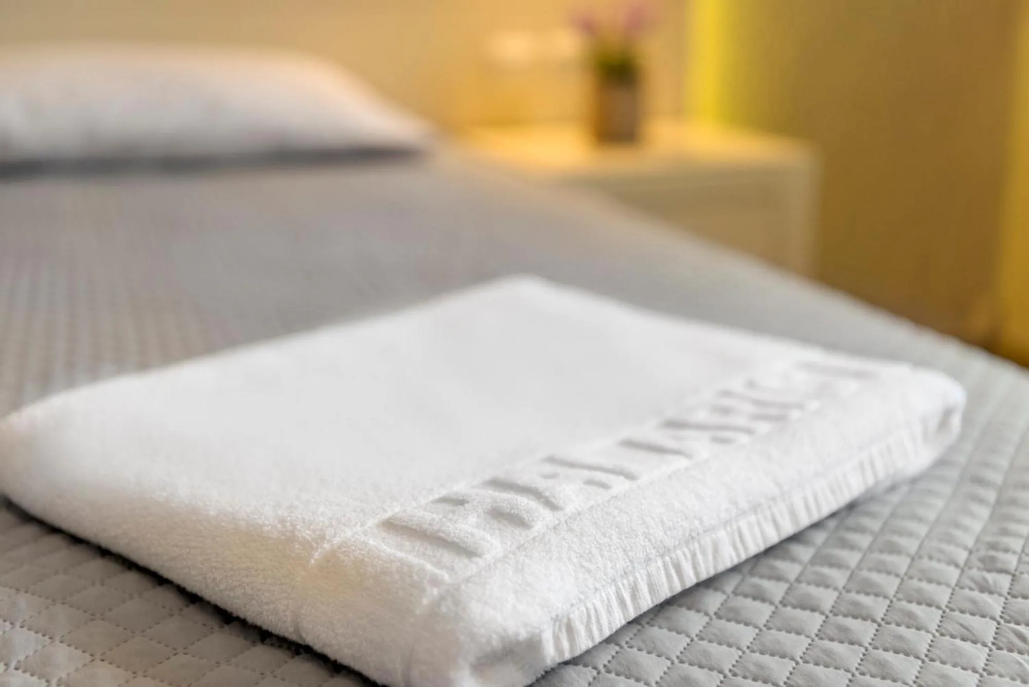 Bed in Halaris Rooms