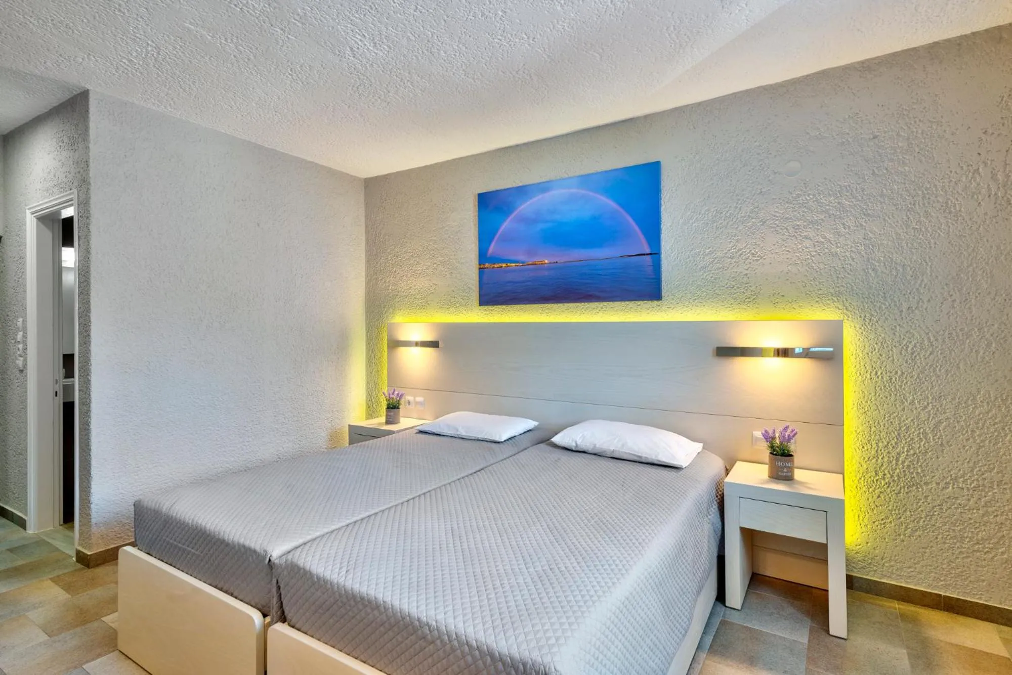 Bed in Halaris Rooms