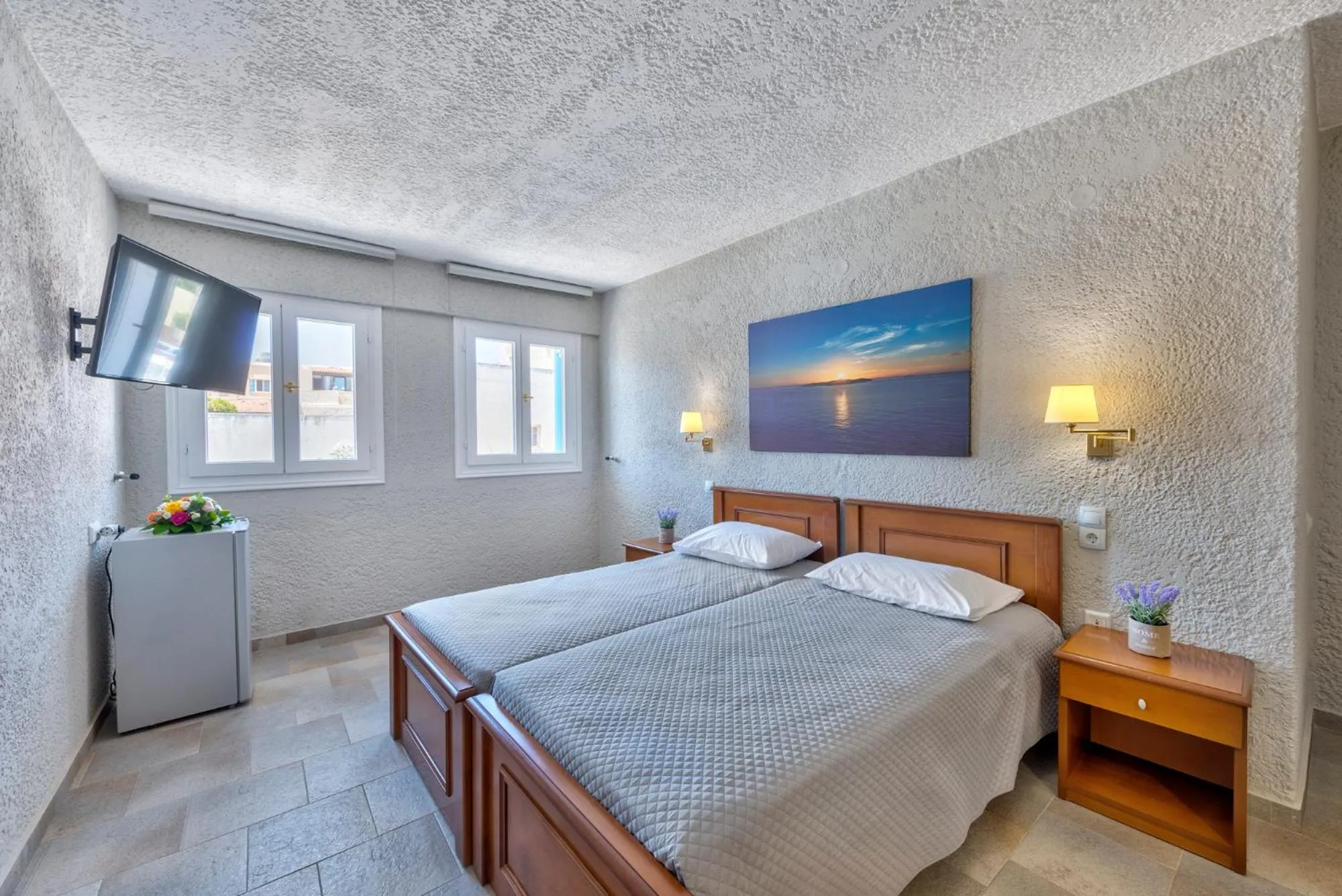 Bed in Halaris Rooms