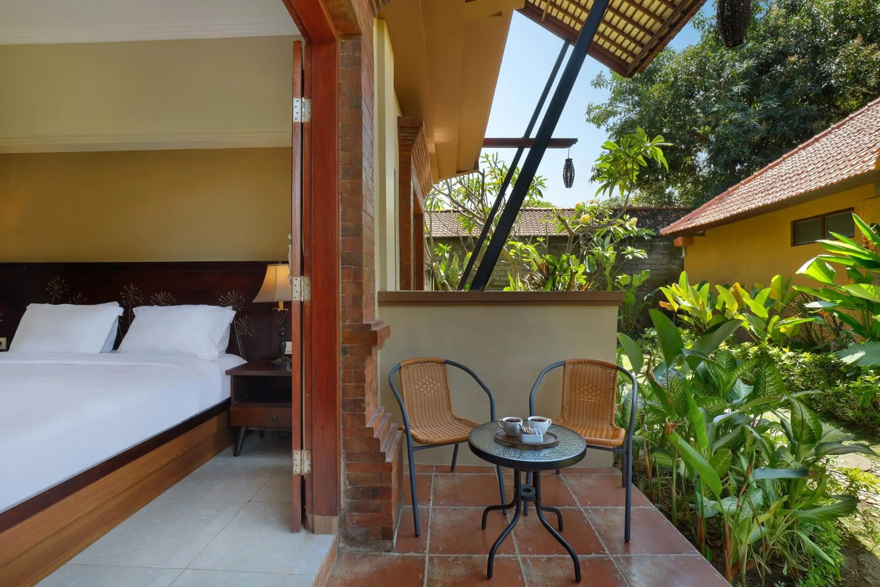 Balcony/Terrace, Bed in Mahe Garden Inn and Villas by Kamara