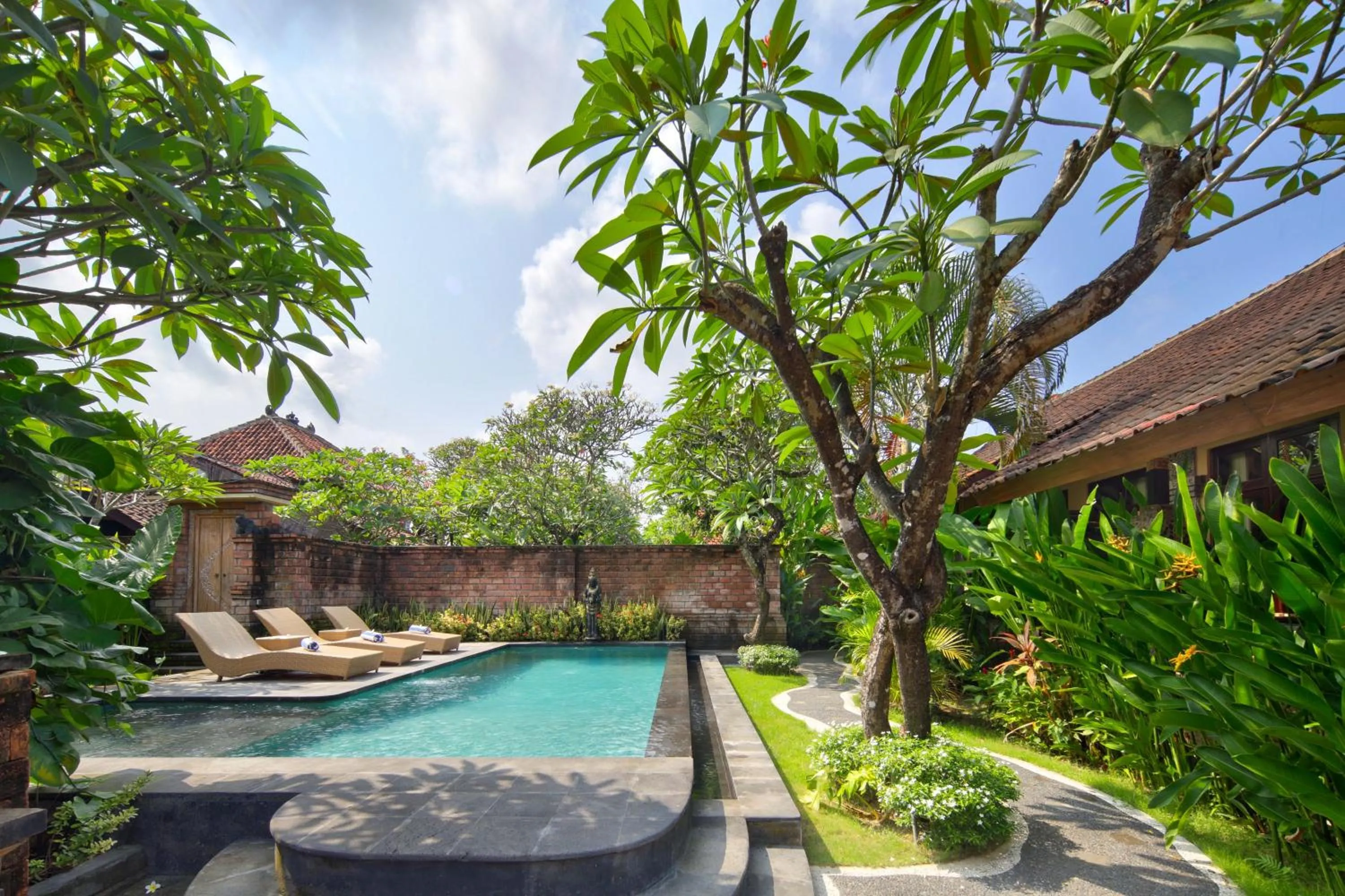 Swimming pool in Mahe Garden Inn and Villas by Kamara
