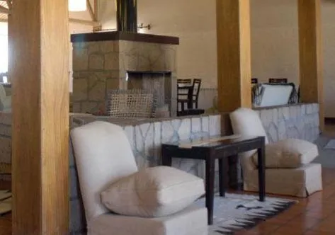 Communal lounge/ TV room in Hotel de Las Nubes