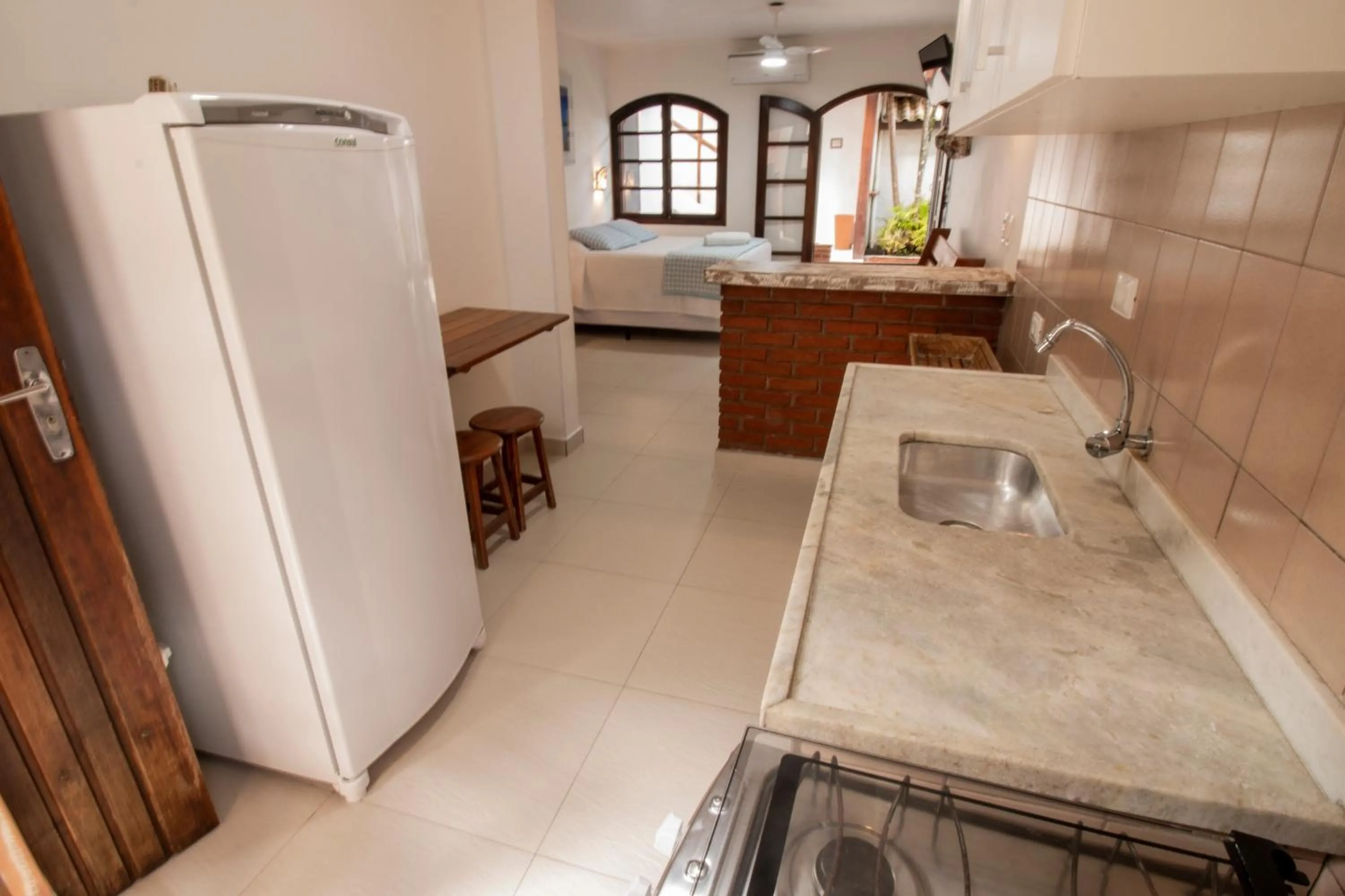 Kitchen or kitchenette in Apart Hotel Porto Kanoas