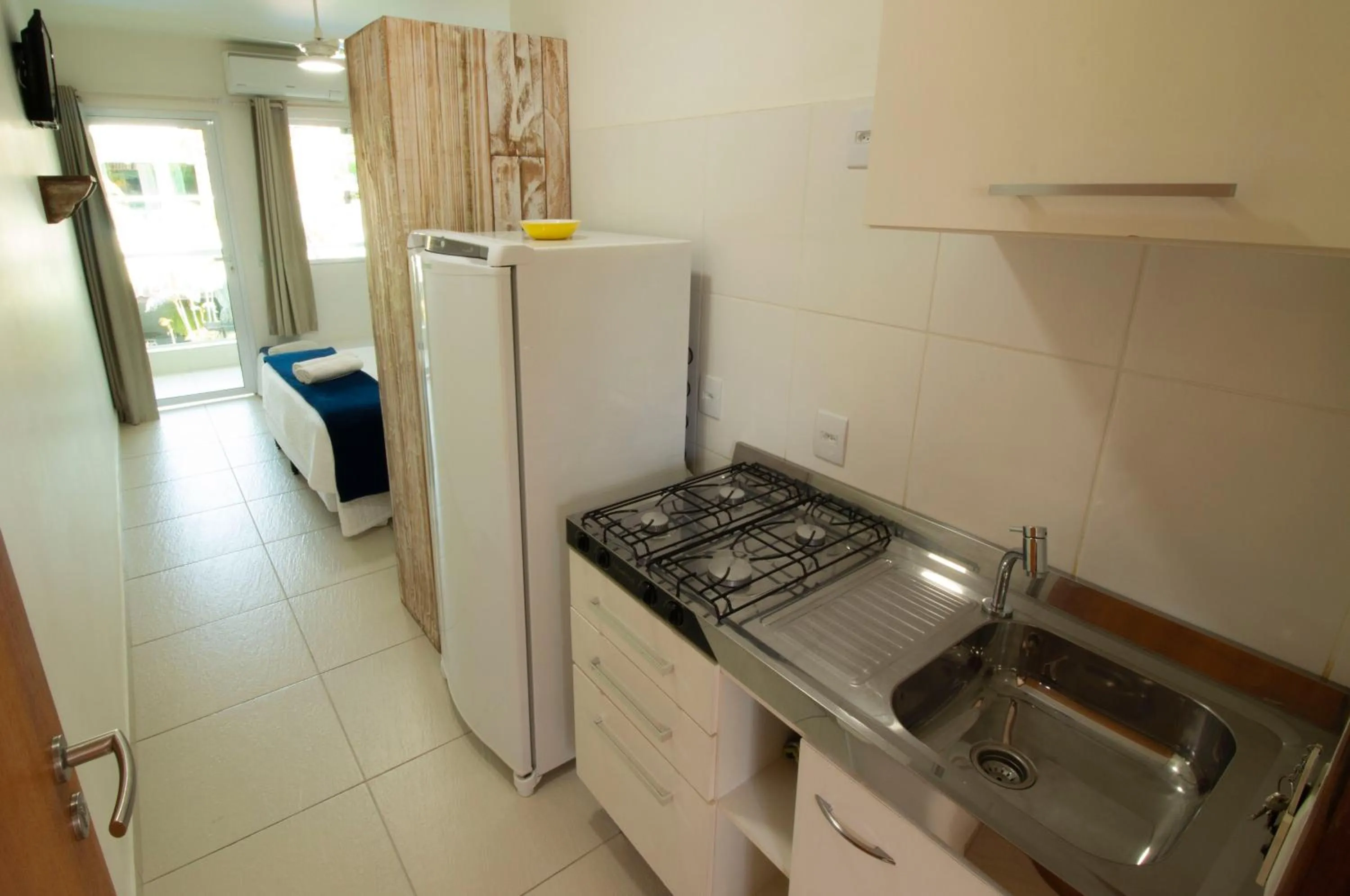 Communal kitchen in Apart Hotel Porto Kanoas