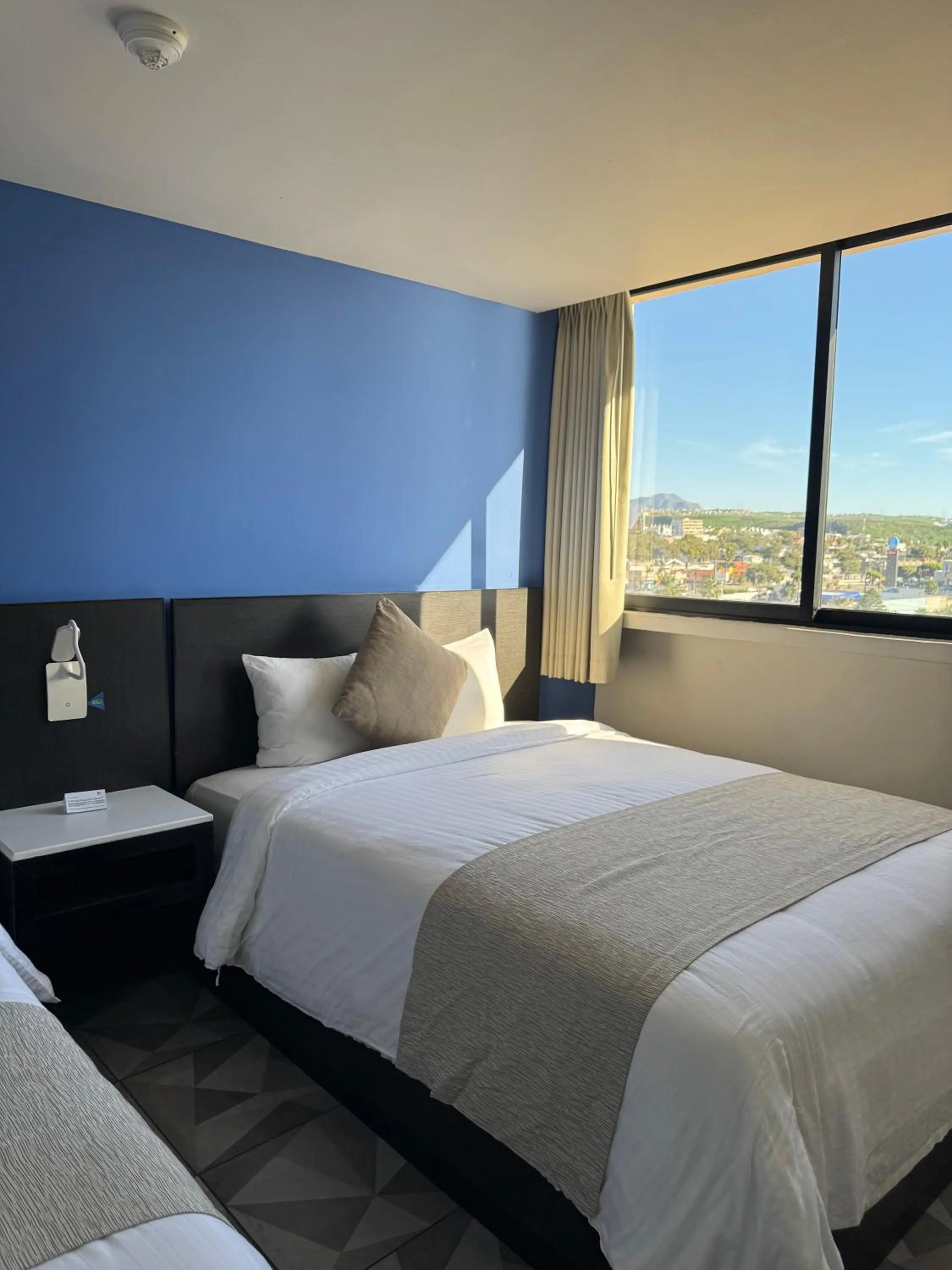 Bed in Hotel Corona Plaza