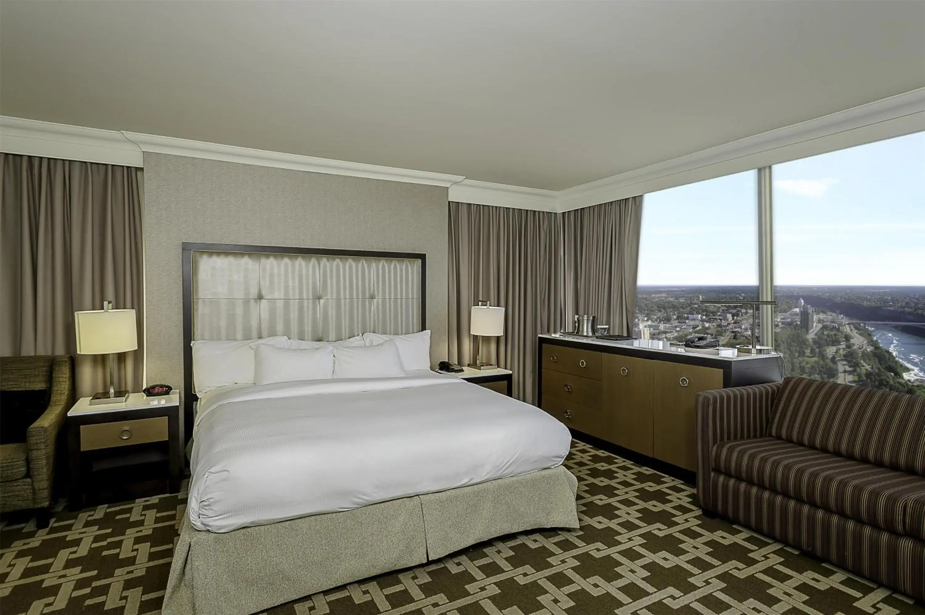 Living room, Bed in Hilton Niagara Falls/ Fallsview Hotel and Suites Living room, Bed in Hilton Niagara Falls/ Fallsview Hotel and Suites