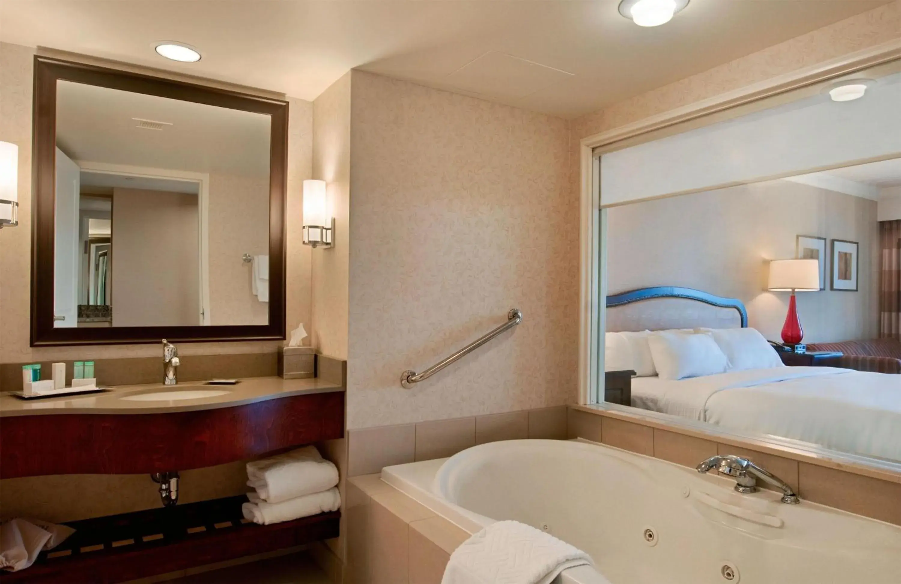 Bathroom, Bed in Hilton Niagara Falls/ Fallsview Hotel and Suites Bathroom, Bed in Hilton Niagara Falls/ Fallsview Hotel and Suites