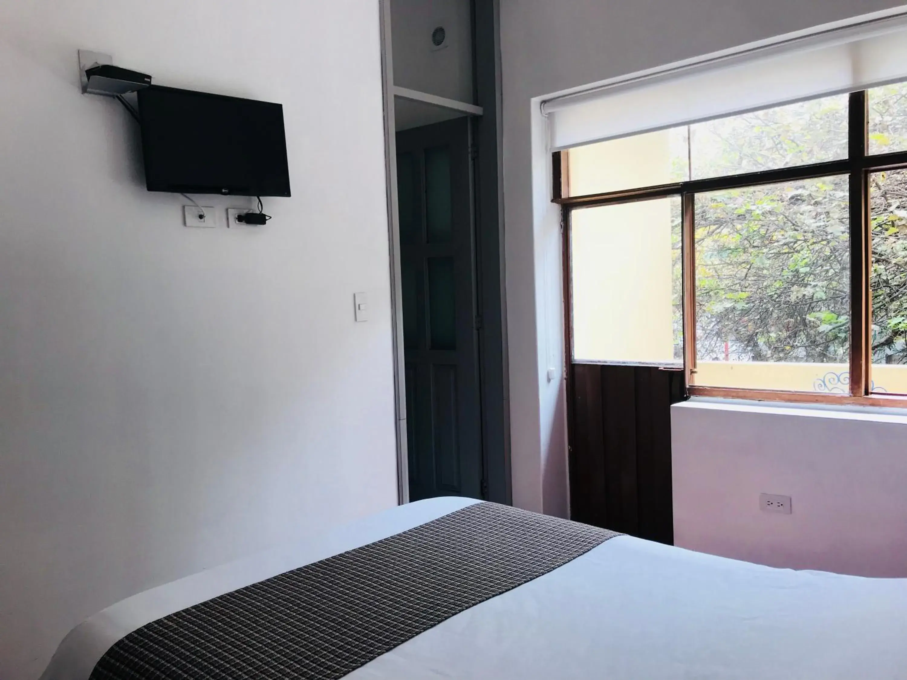 Bed in Hostal Posada del Maple Bed in Hostal Posada del Maple