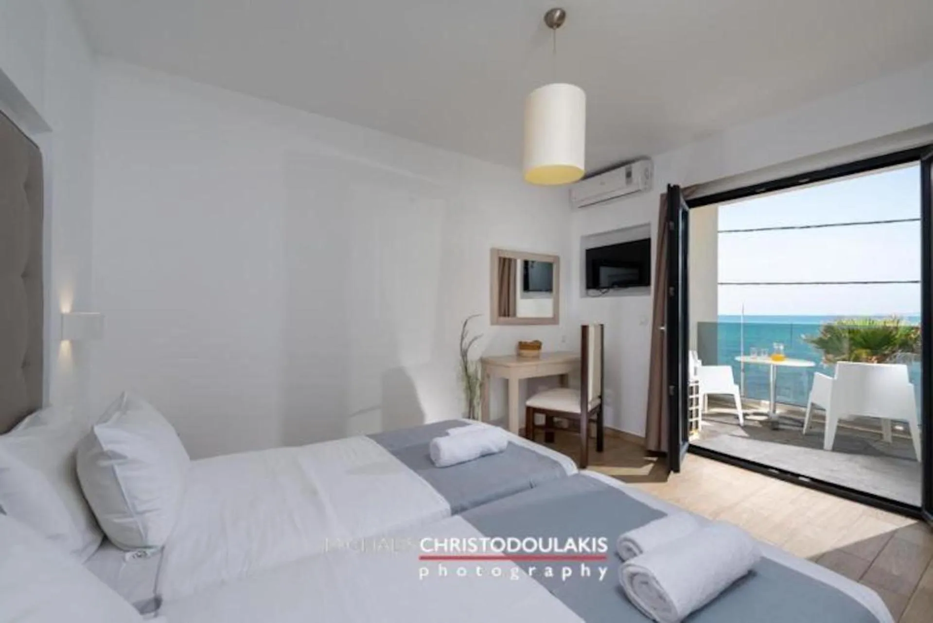 Bed in Golden Bay Boutique Hotel & Bungalows