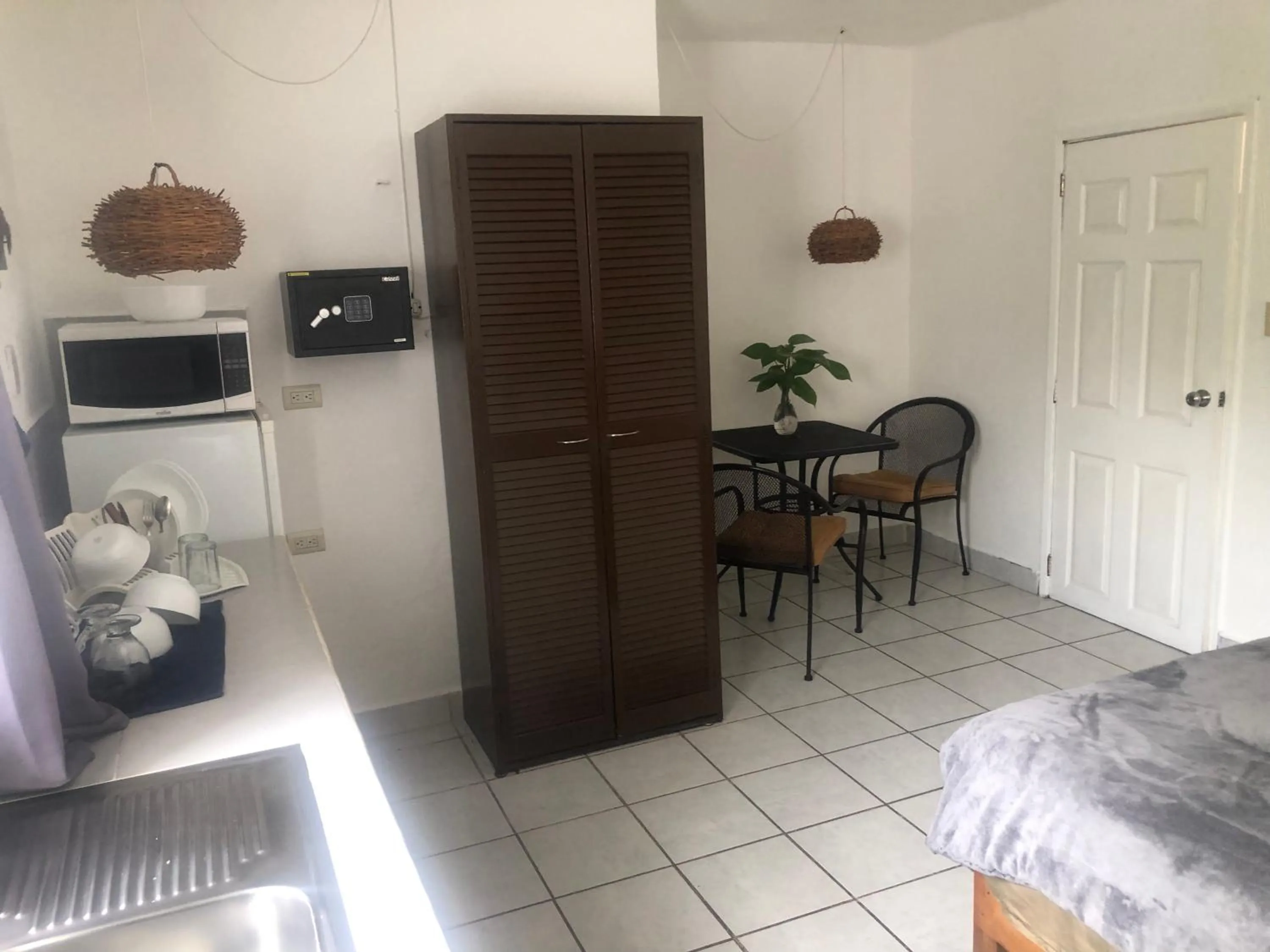 Living room, Bed in Caribo Cozumel