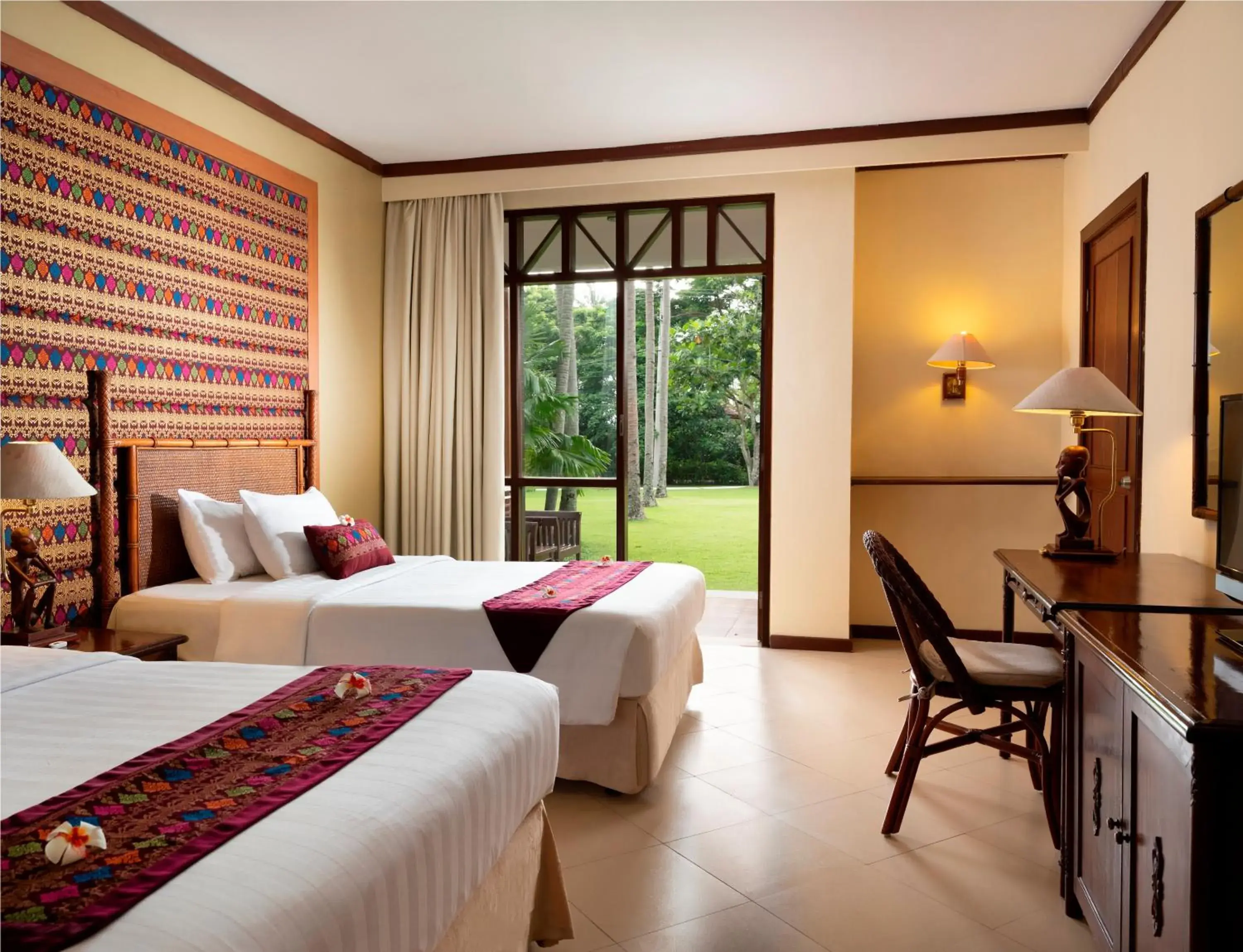 Bed in Mangsit Suites by Holiday Resort Lombok Bed in Mangsit Suites by Holiday Resort Lombok