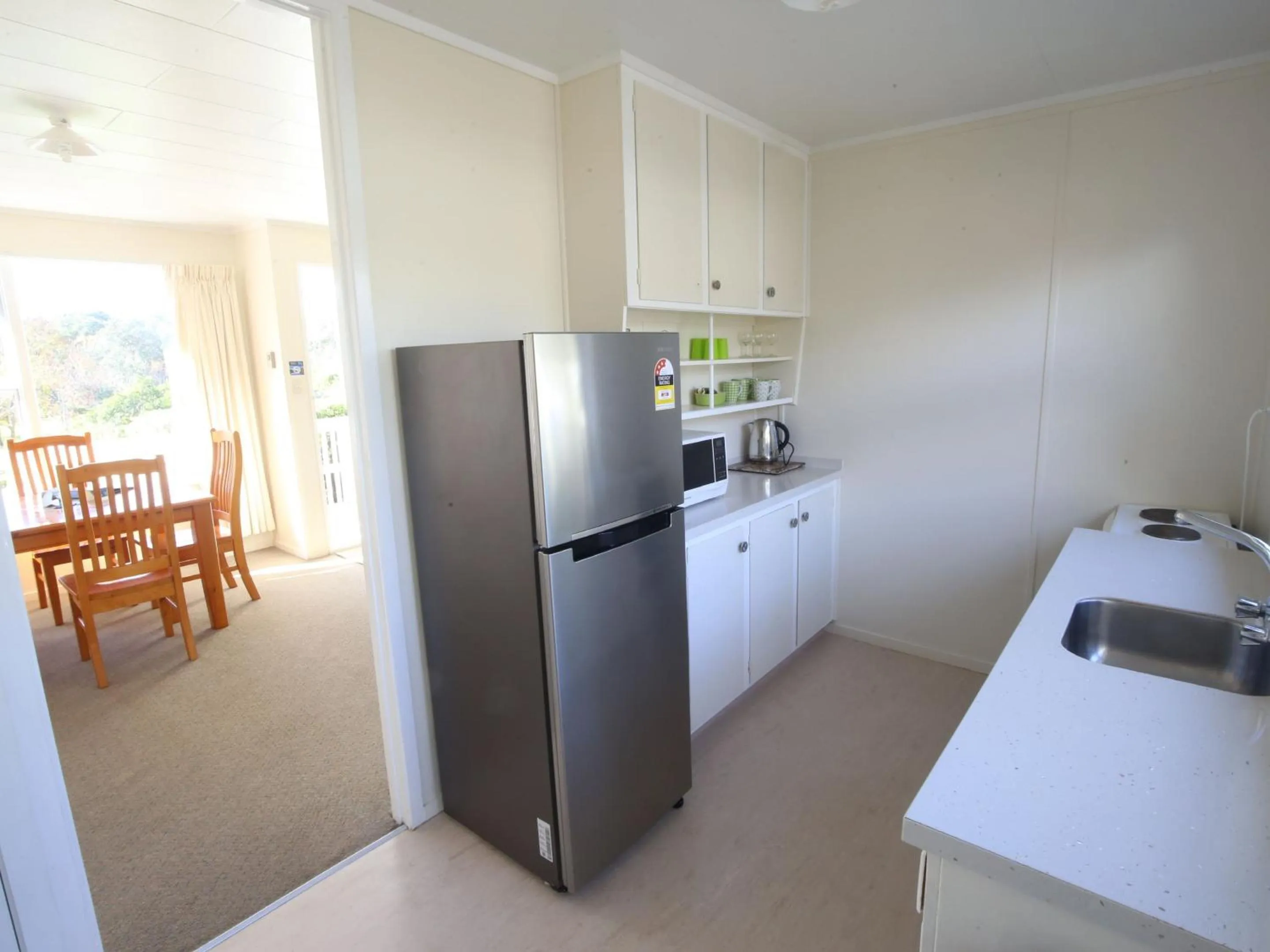 Kitchen or kitchenette in Orere Point TOP 10 Holiday Park