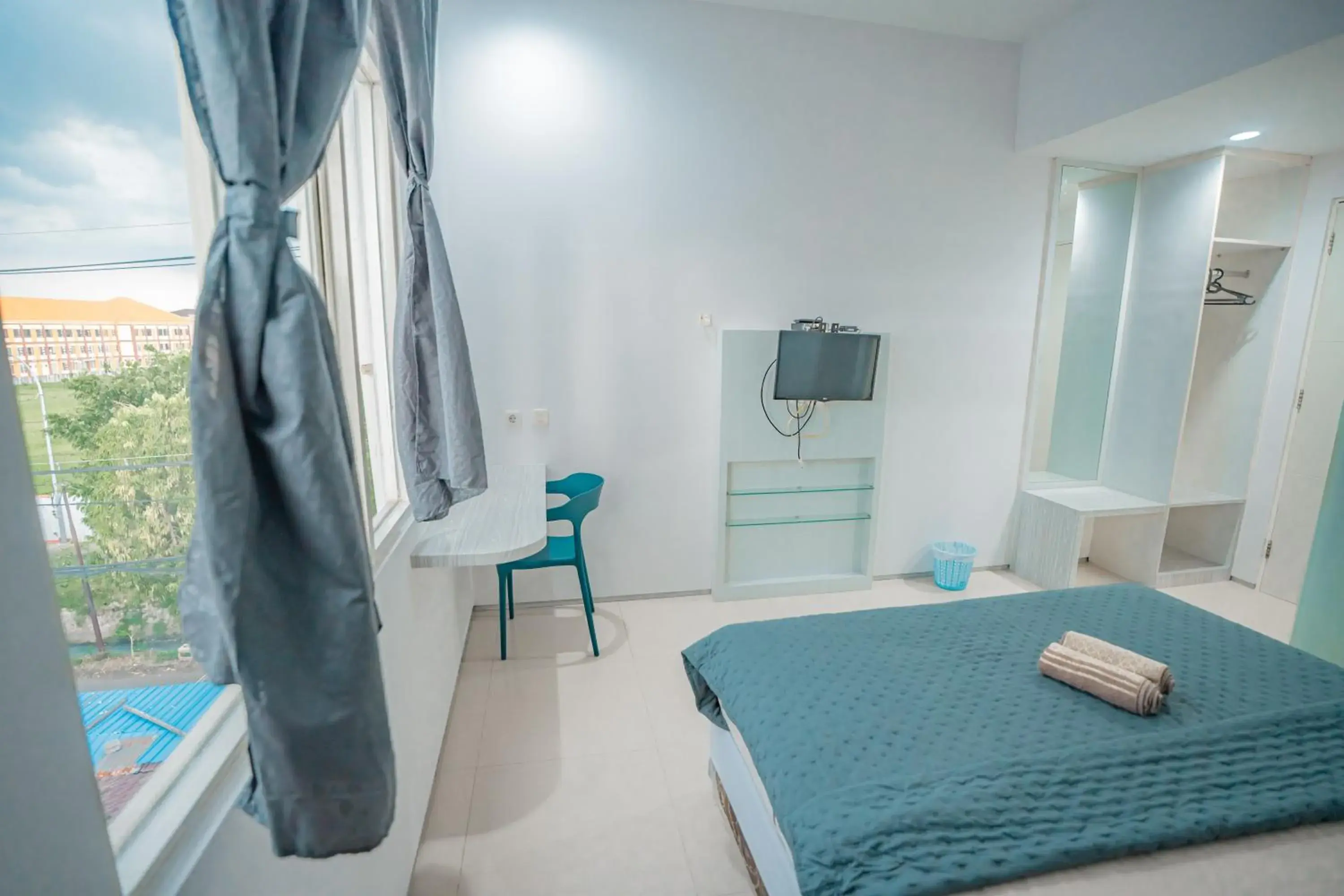 Bedroom, Bed in Hotel Pratisarawirya by The Loka Bedroom, Bed in Hotel Pratisarawirya by The Loka