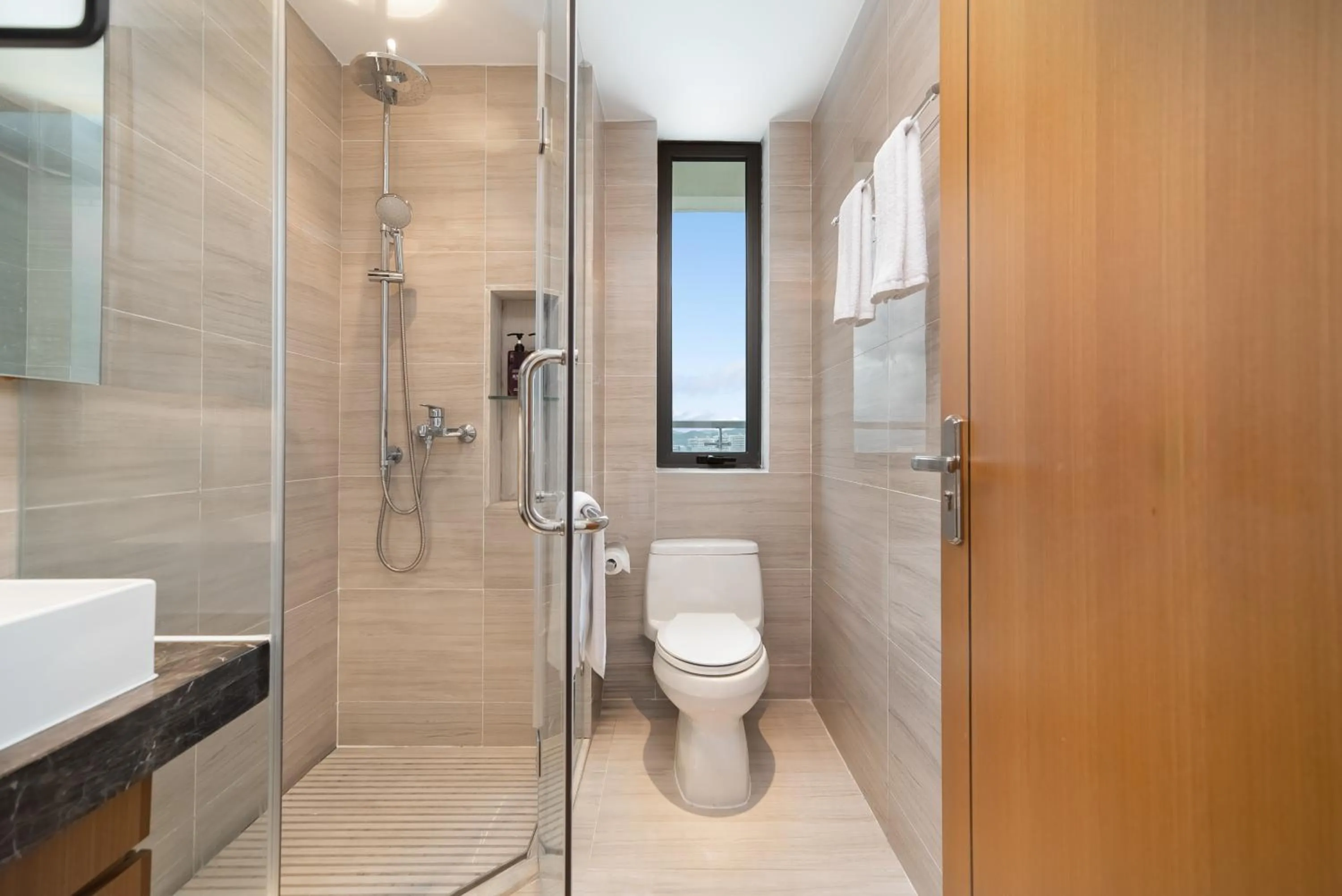 Shower in Elnob Seaview Aparthotel Hai Tang Bay Sanya