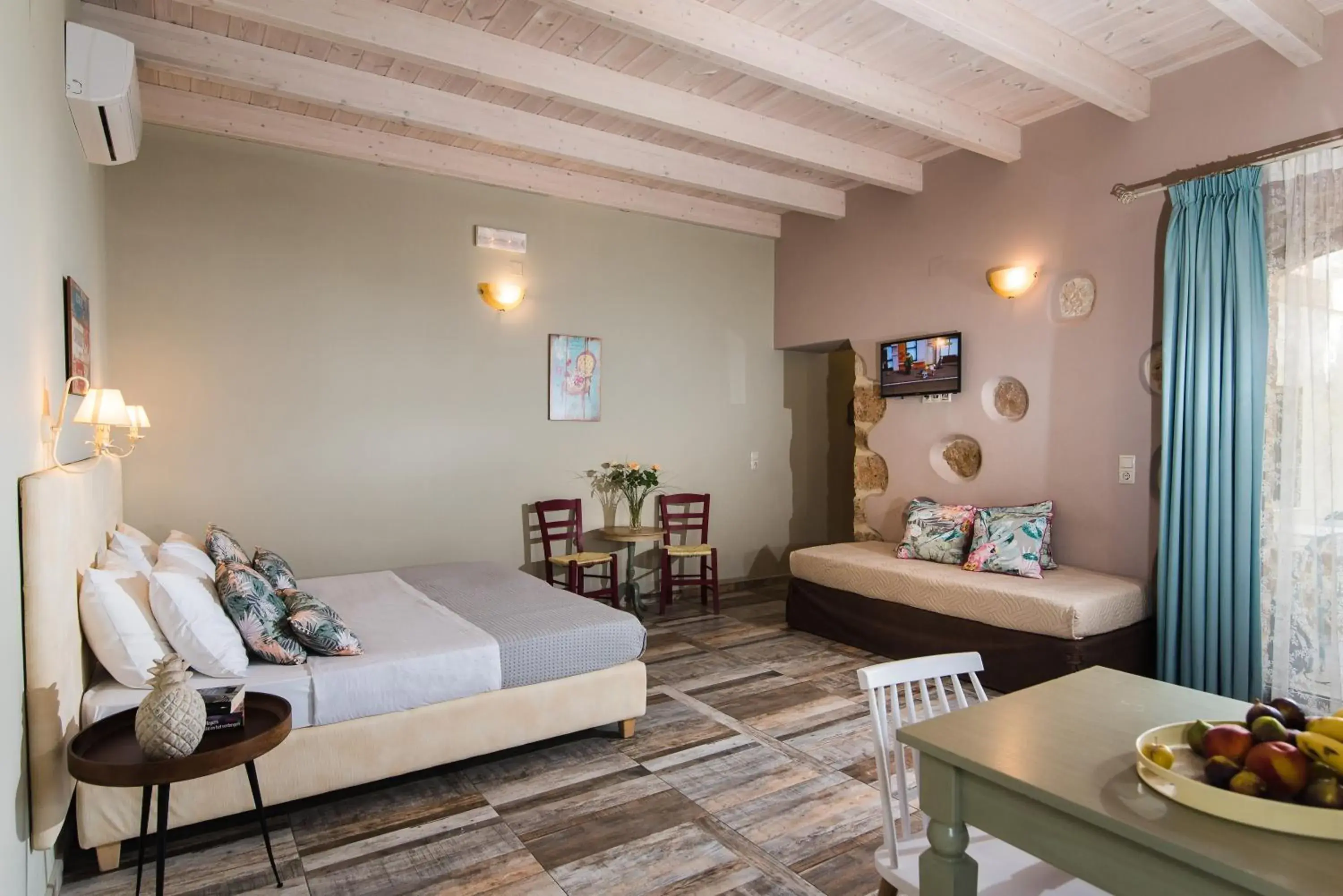 Seating area, Bed in Sarpidon Apartments Seating area, Bed in Sarpidon Apartments