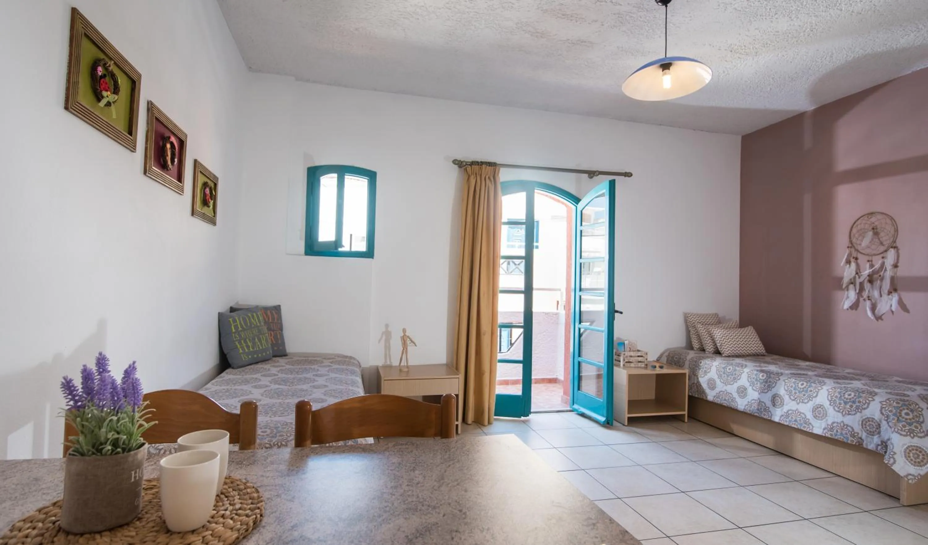 Living room, Bed in Sarpidon Apartments