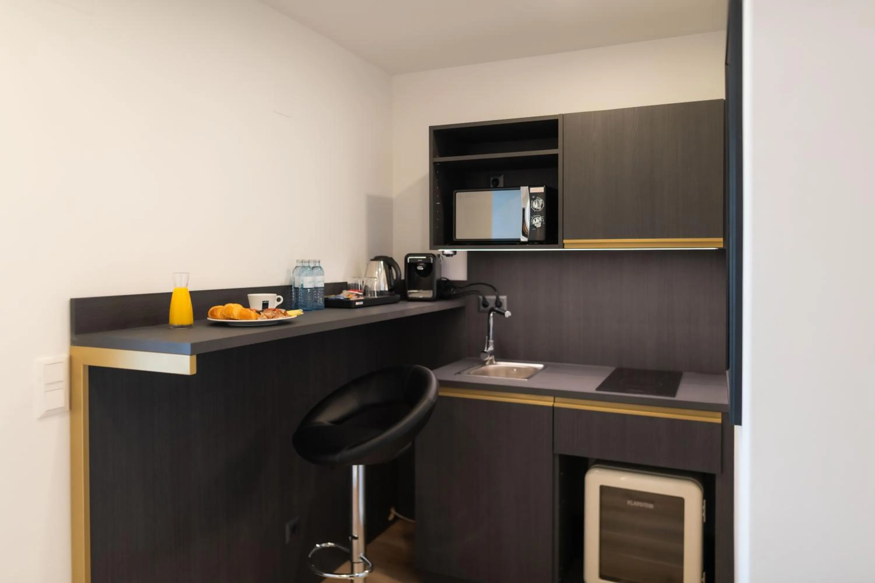 Kitchen or kitchenette in Florum Hotel