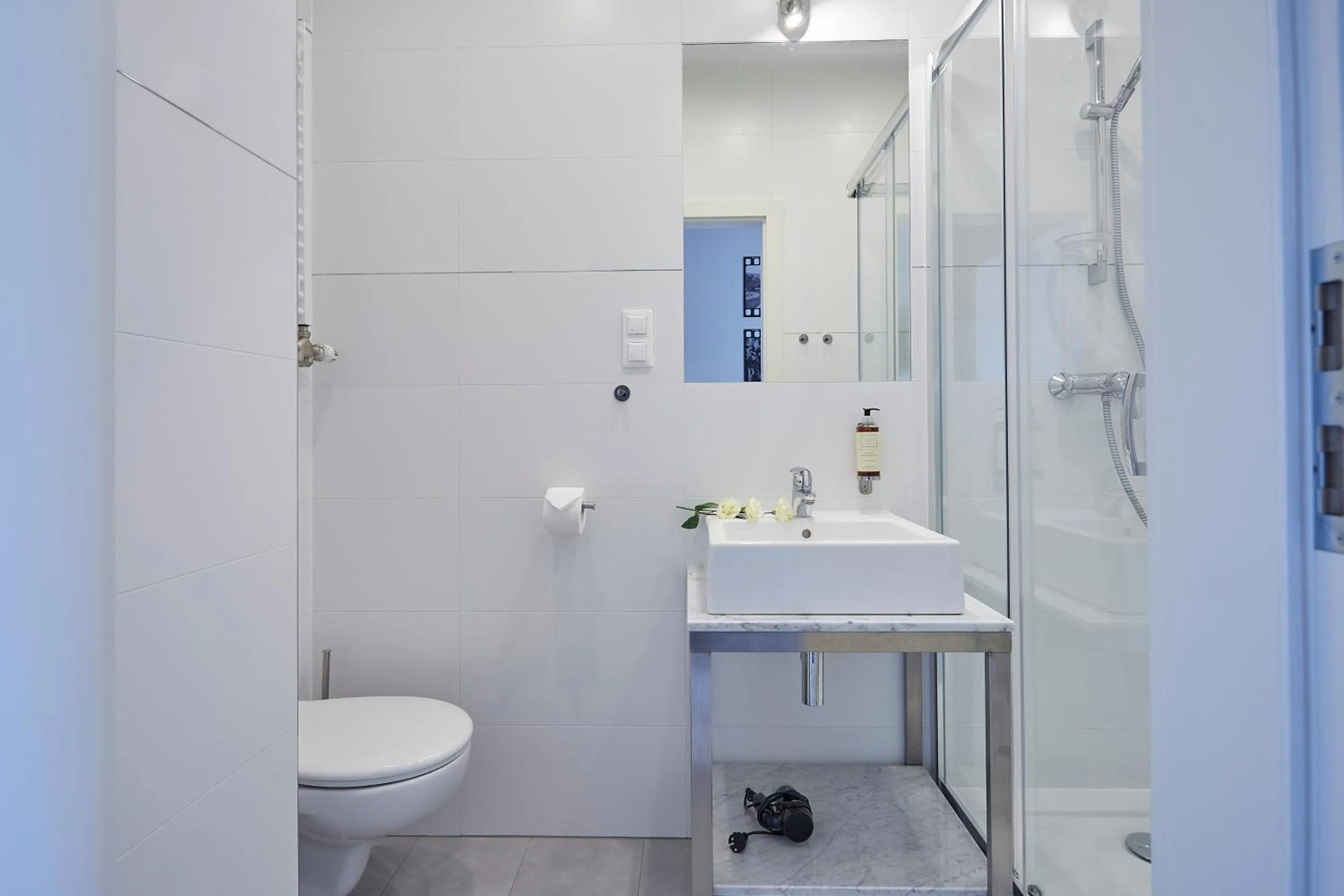 Shower in FLORIANSKA 32 by PI Apartments