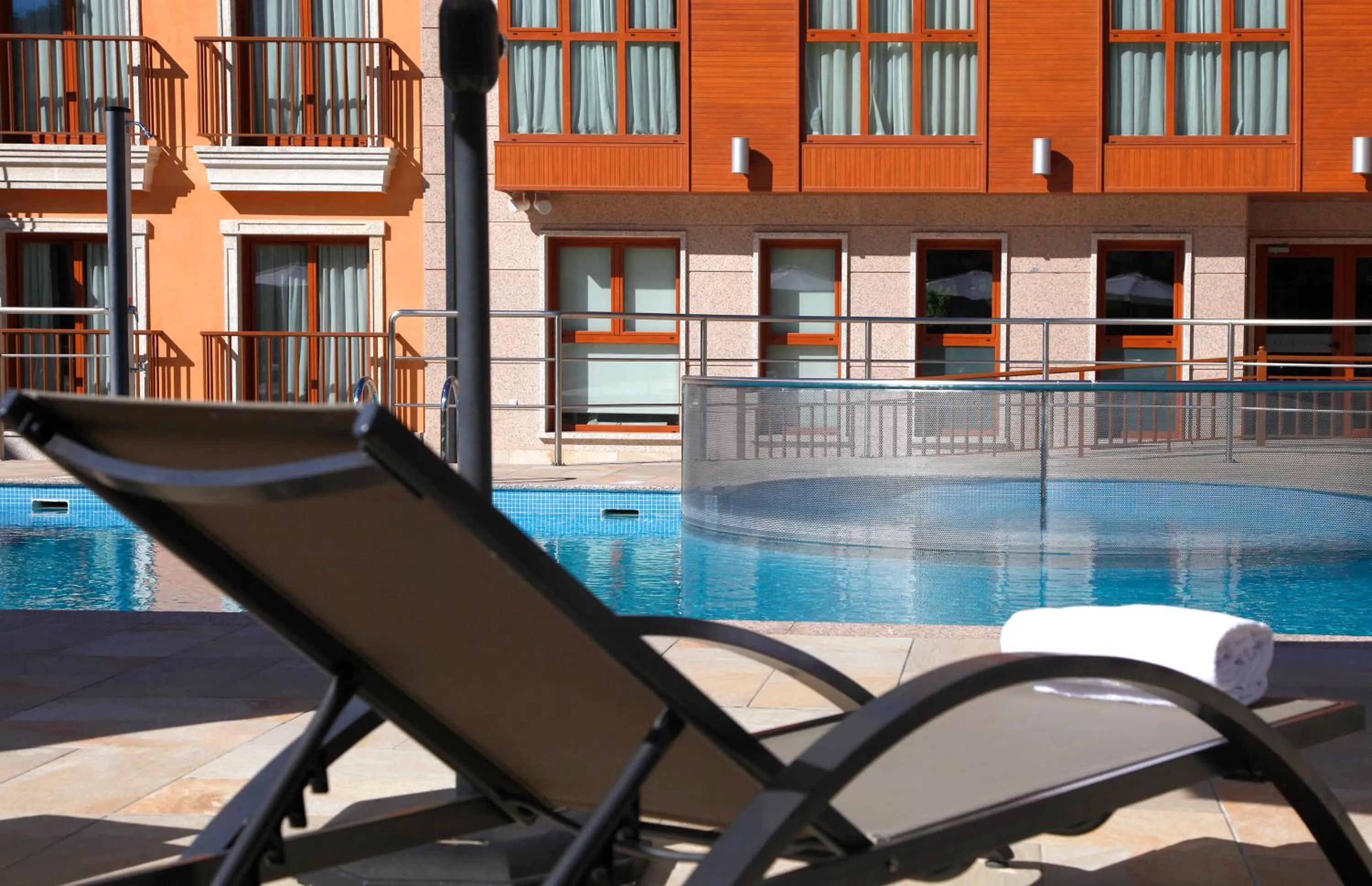 Swimming pool in Apartahotel & Spa Jacetania