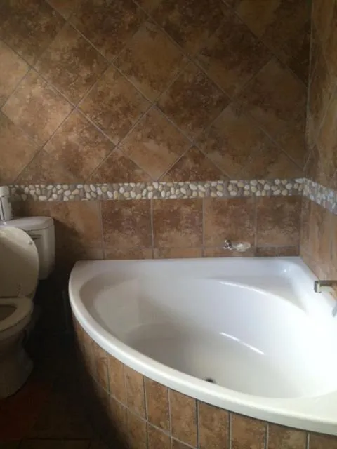 Bathroom in Woodpecker B&B