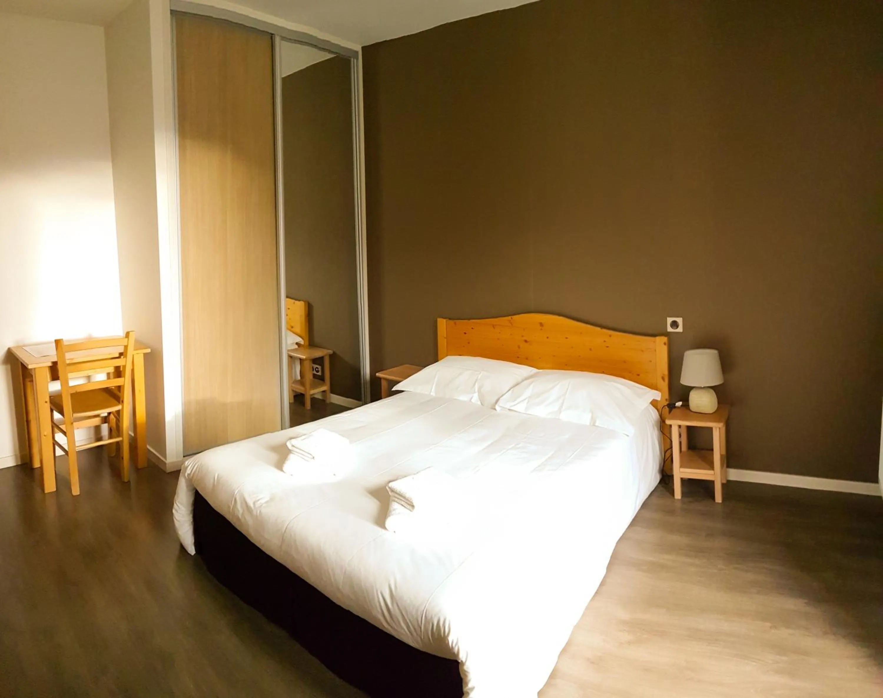 Bed in Hôtel du Soleil