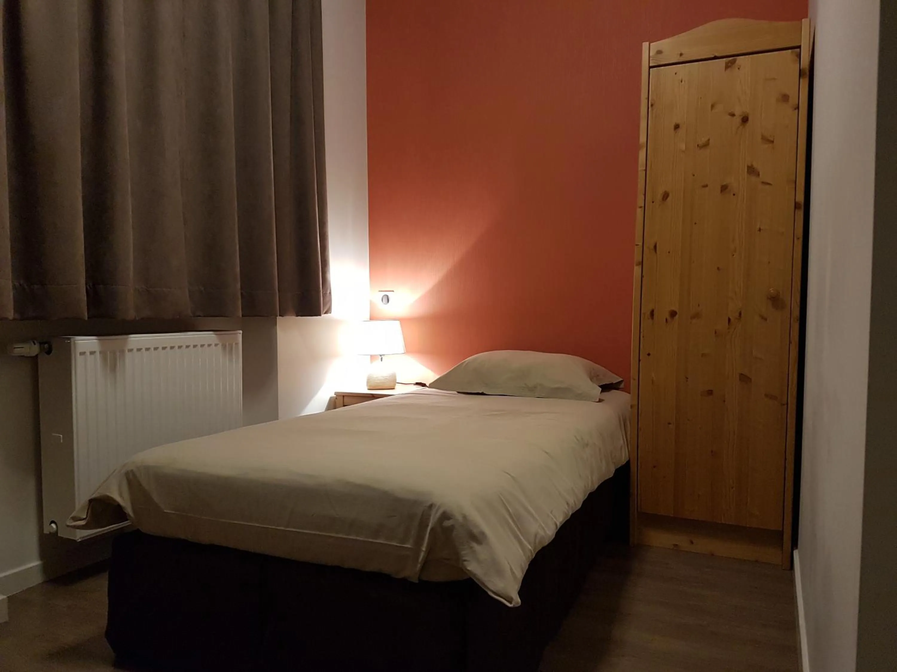 Photo of the whole room, Bed in Hôtel du Soleil