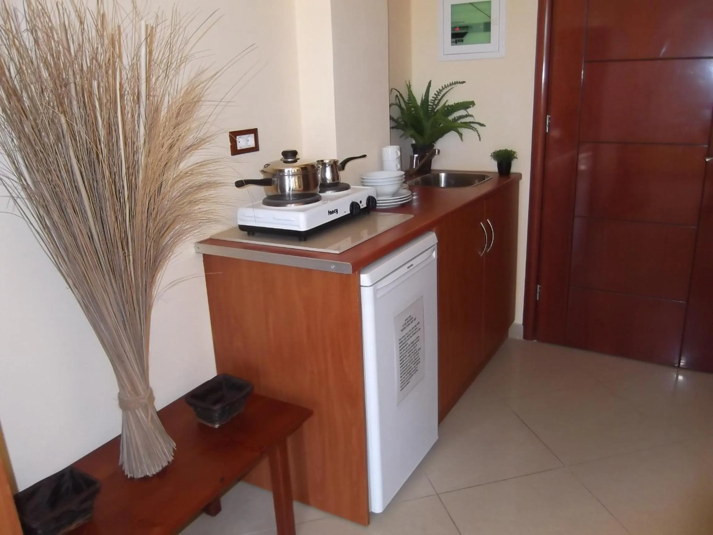 Kitchen or kitchenette in Mariana Hotel