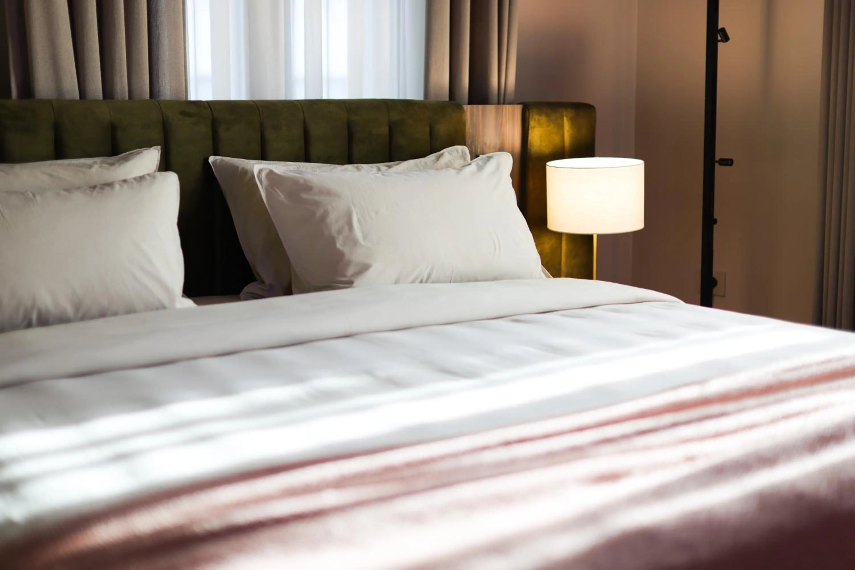 Bed in Padam Boutique Hotel